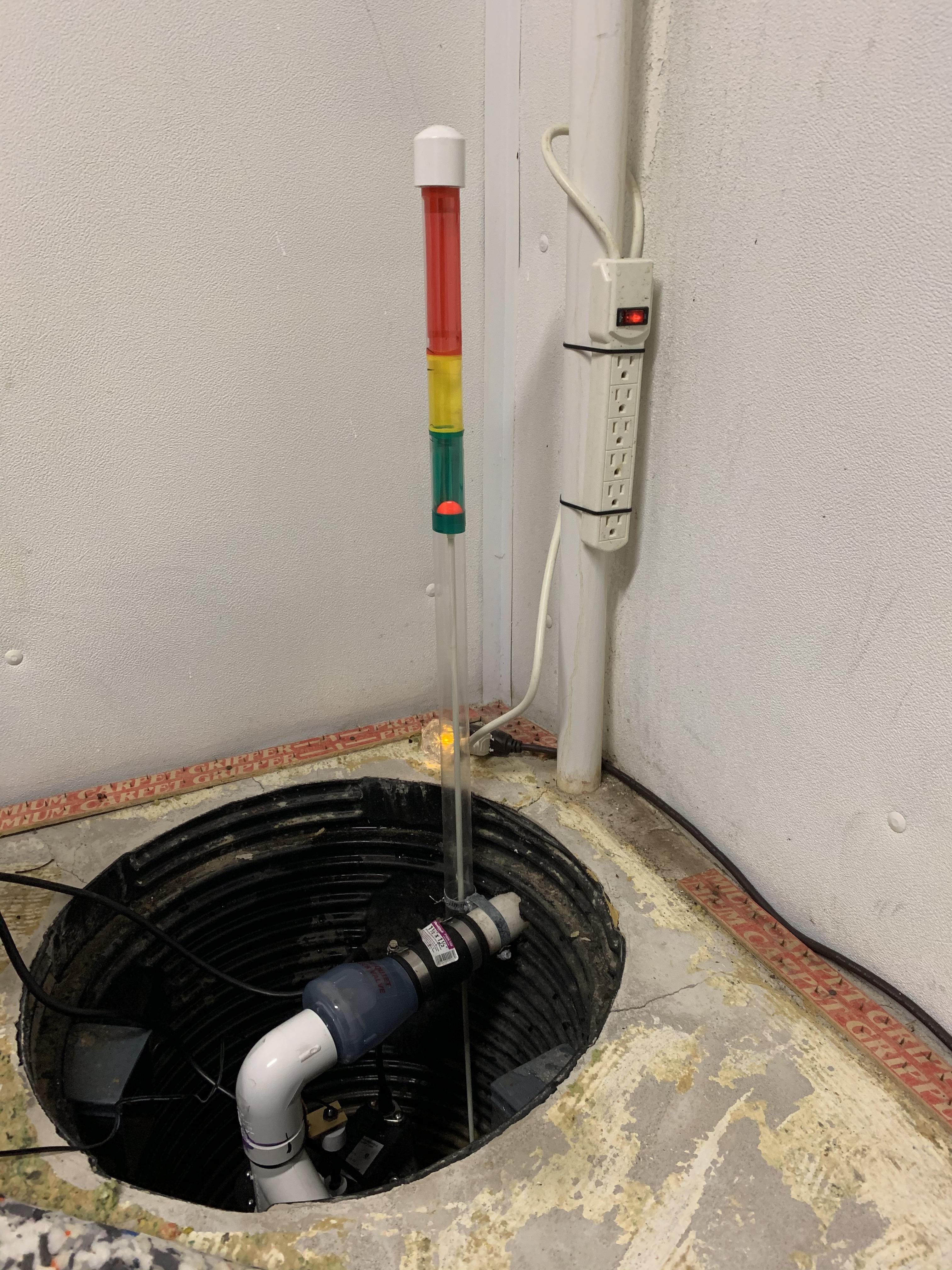 Homeowner installed a cork visual level to show if his sump pump in