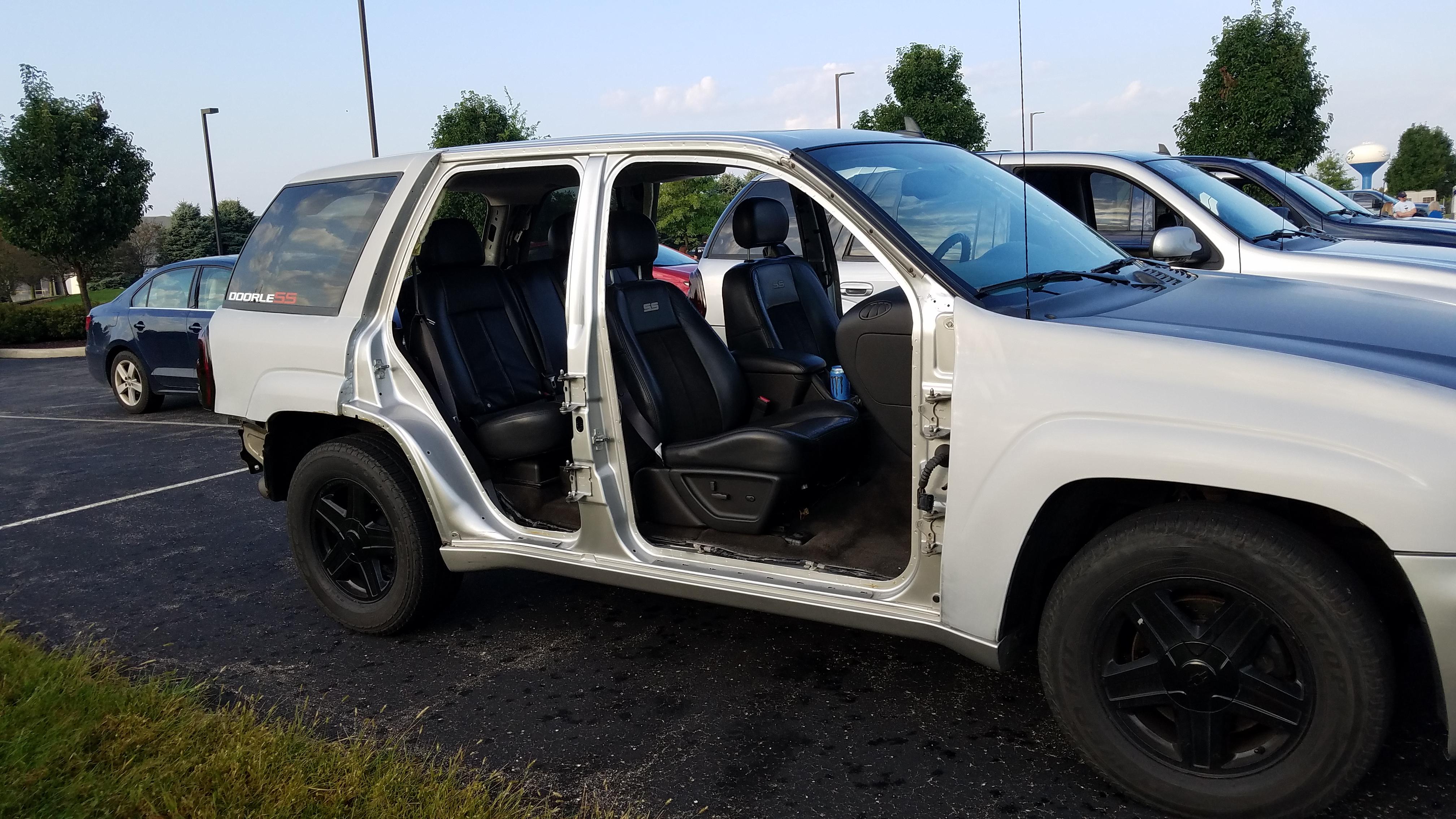 Weight reduction bro. All 4 doors and the rear hatch. r/Shitty_Car_Mods