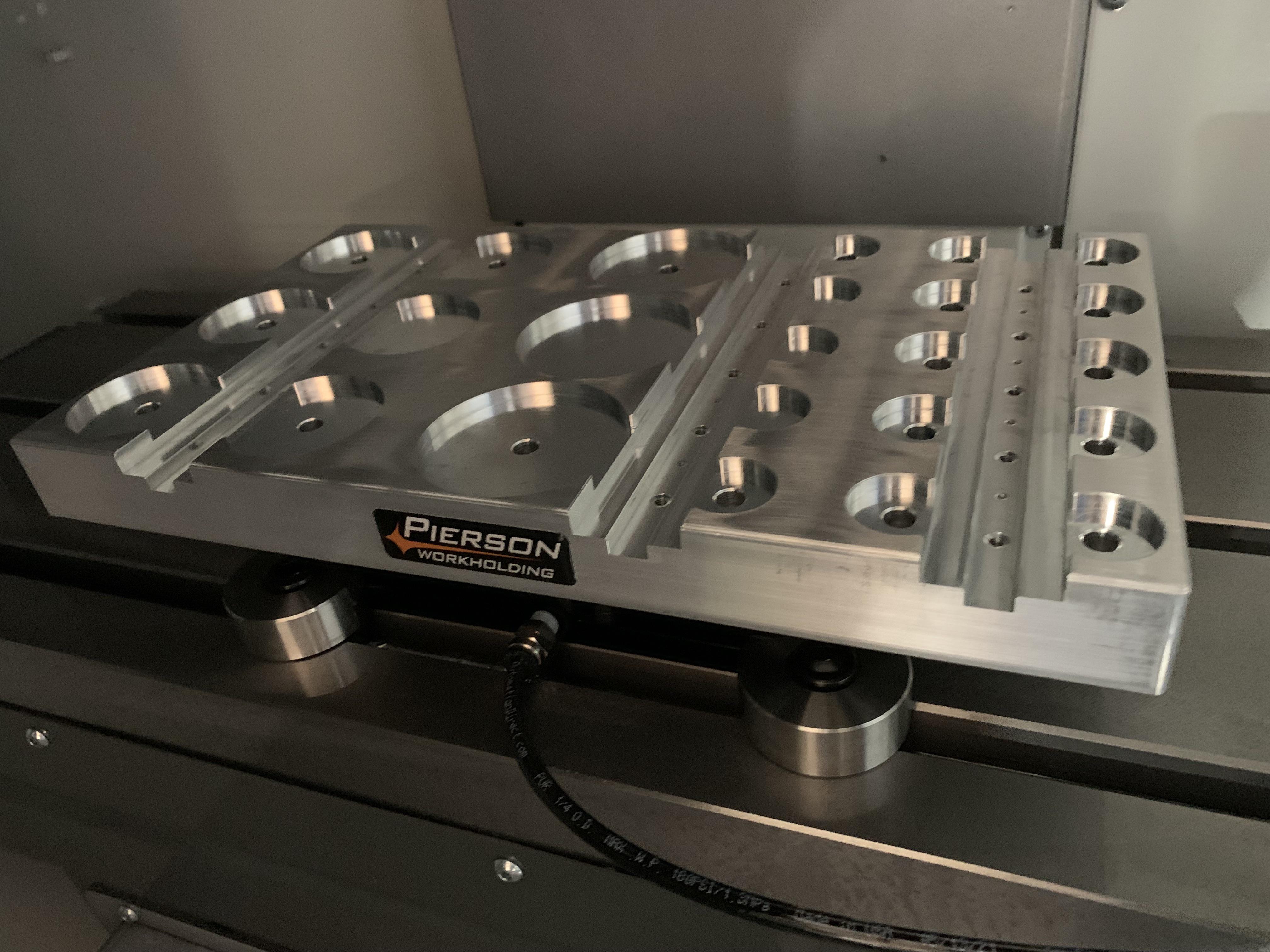 Fixture plate that I designed, programmed, and machined. First part I