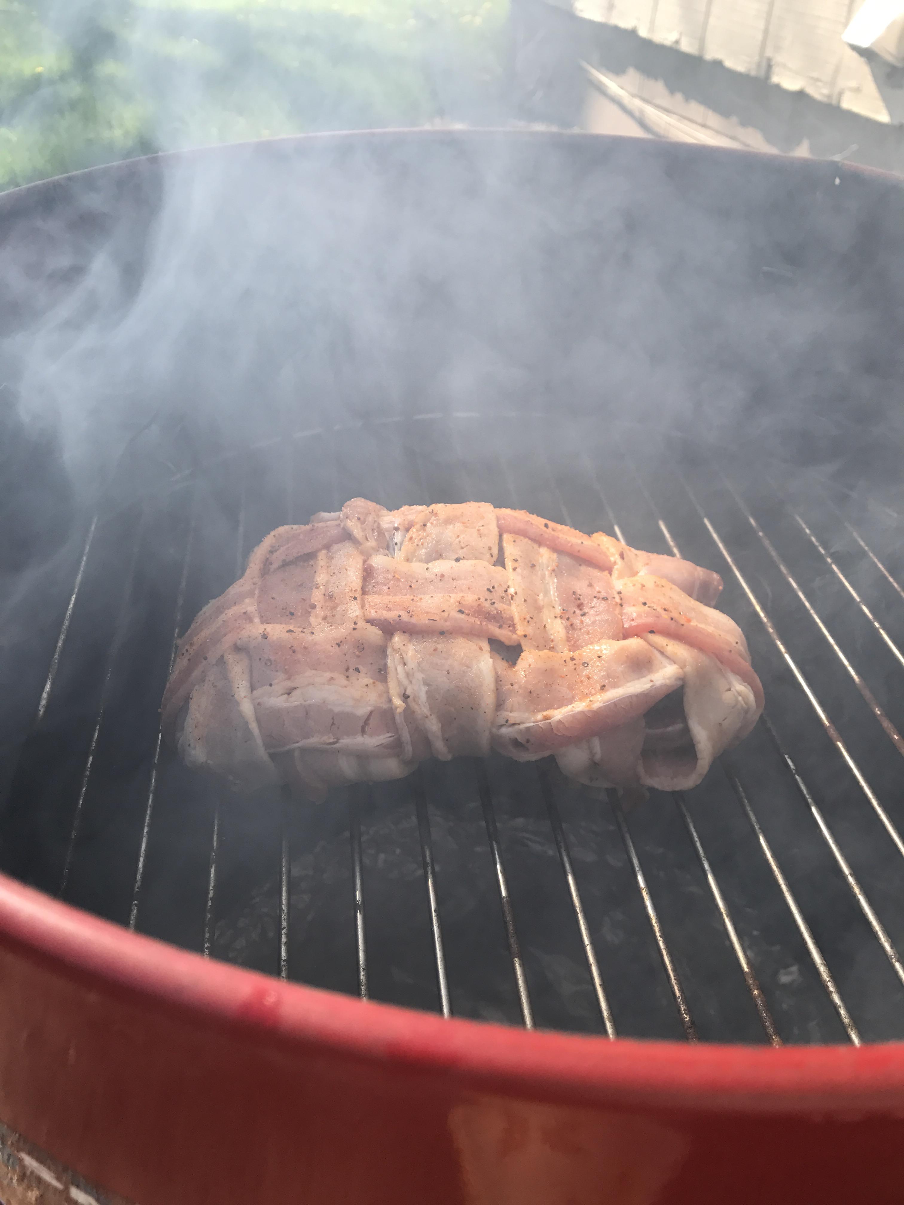 First attempt on the smoker grill. Bacon wrapped goose breast marinated
