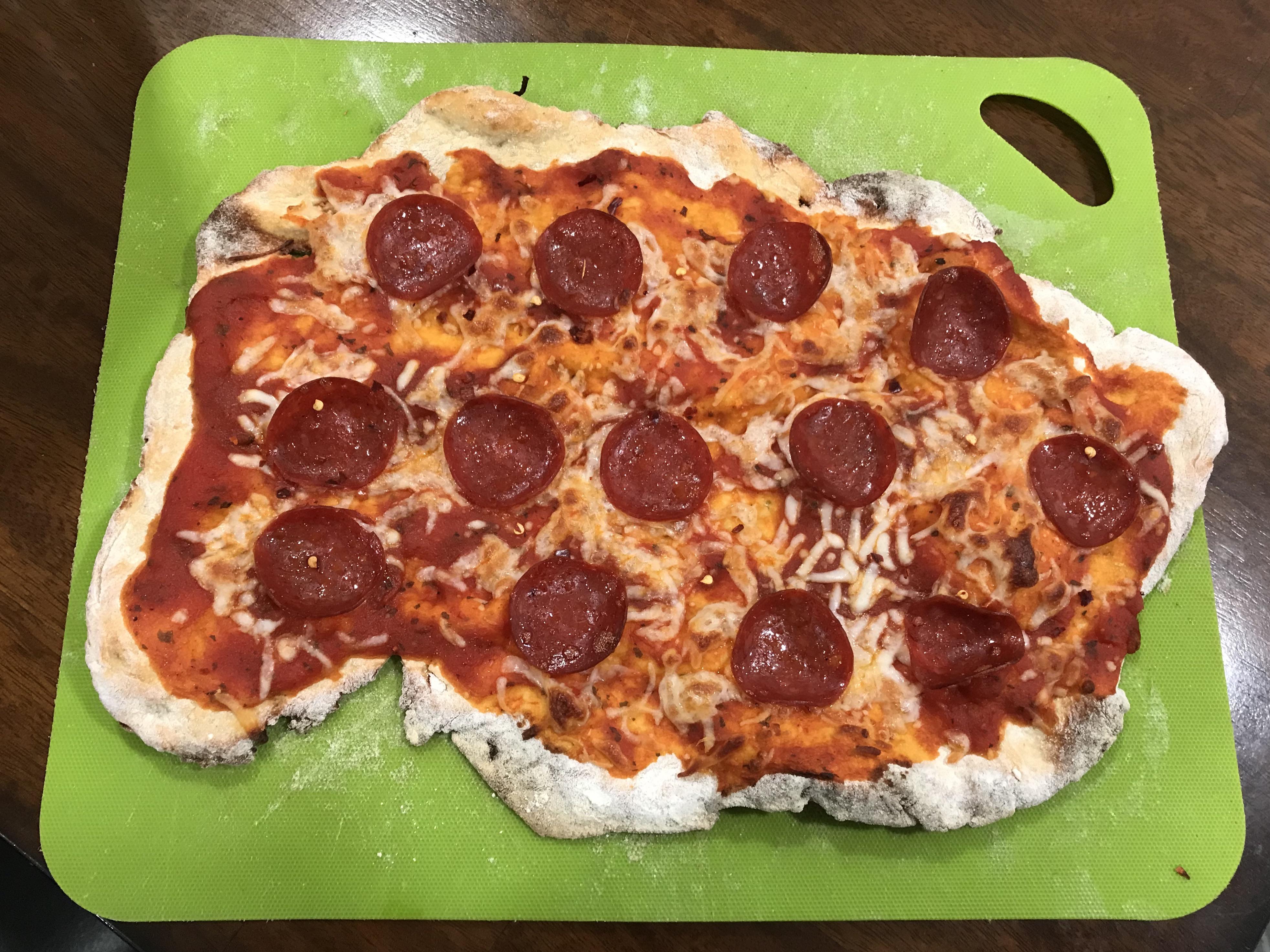 A delicious, filling, homemade pizza. (Ugly but good!) r/1200isplenty