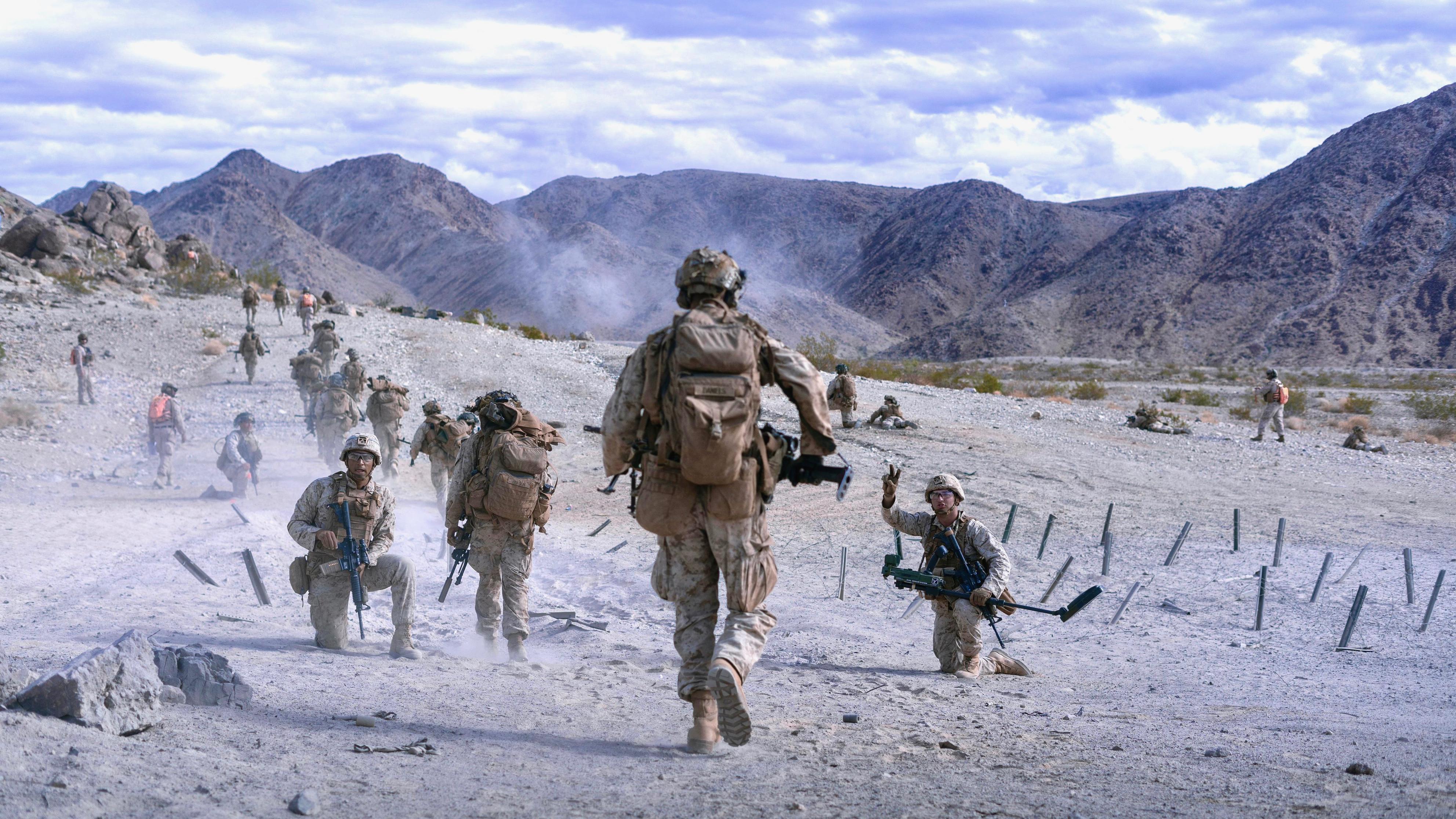 Marines with 3rd Marine Division rush machine gun hill on Range 400