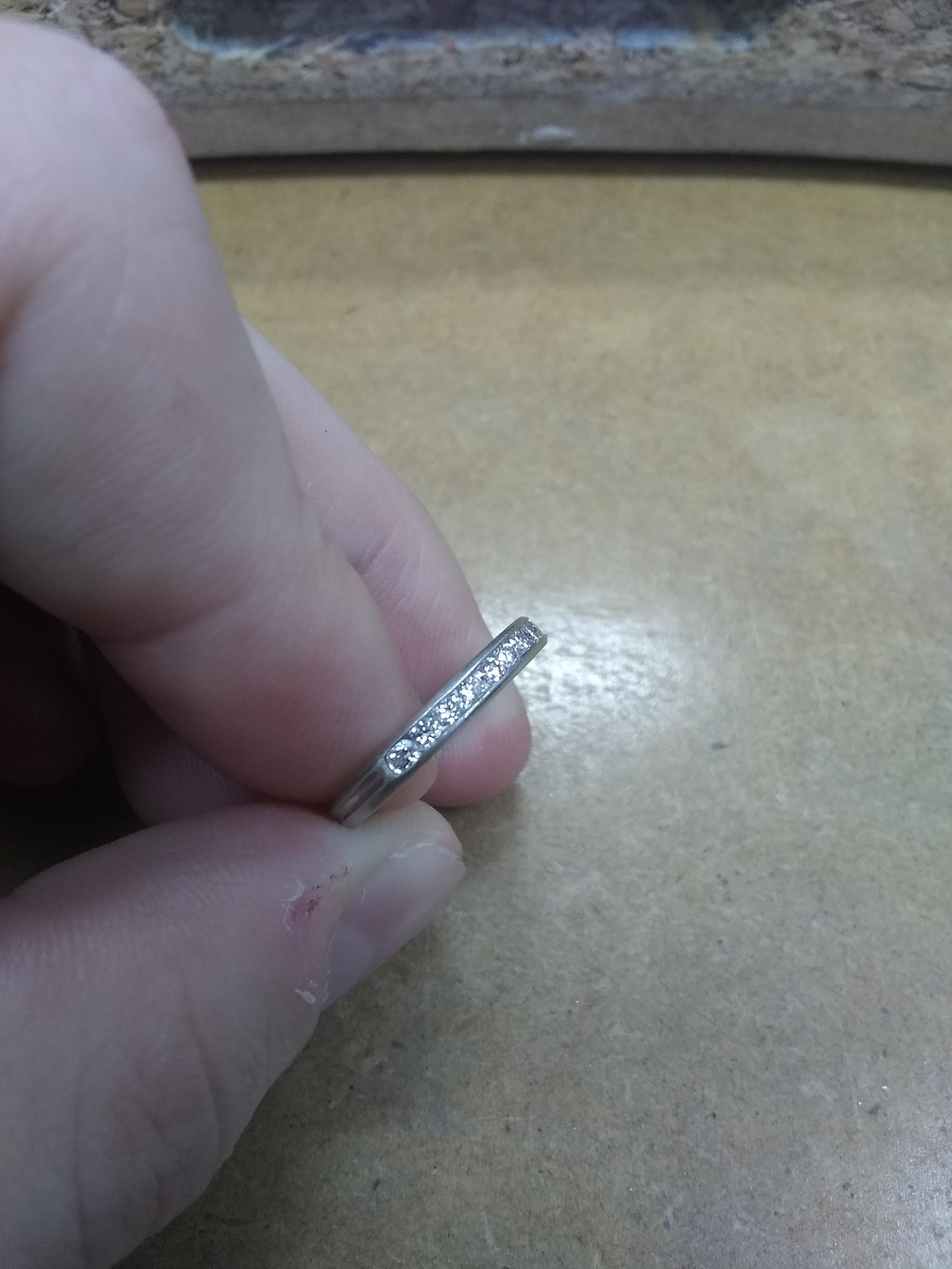 Found this Tiffany ring. The engraving inside says it's platinum and