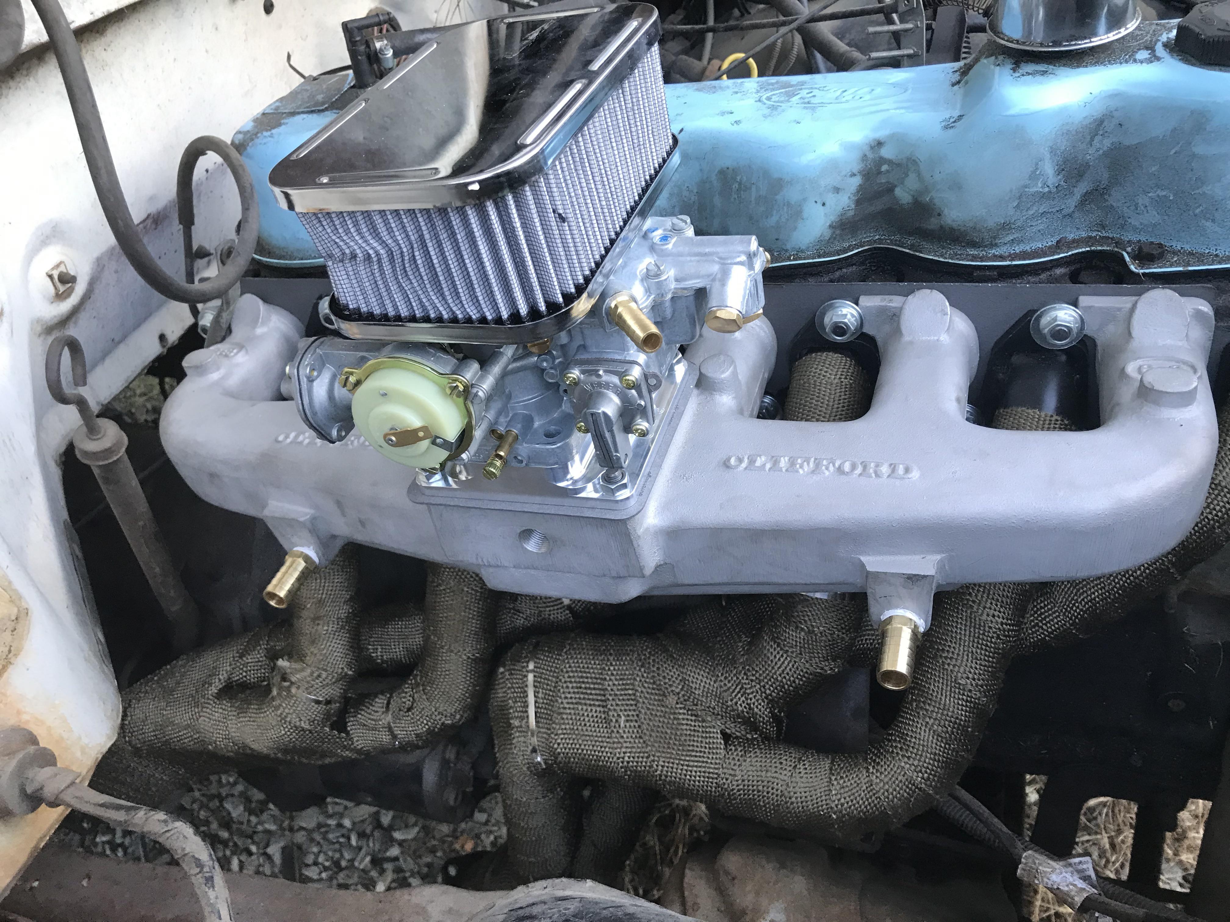 Clifford 300ci intake and manifolds kit mounted, carb is mounted for