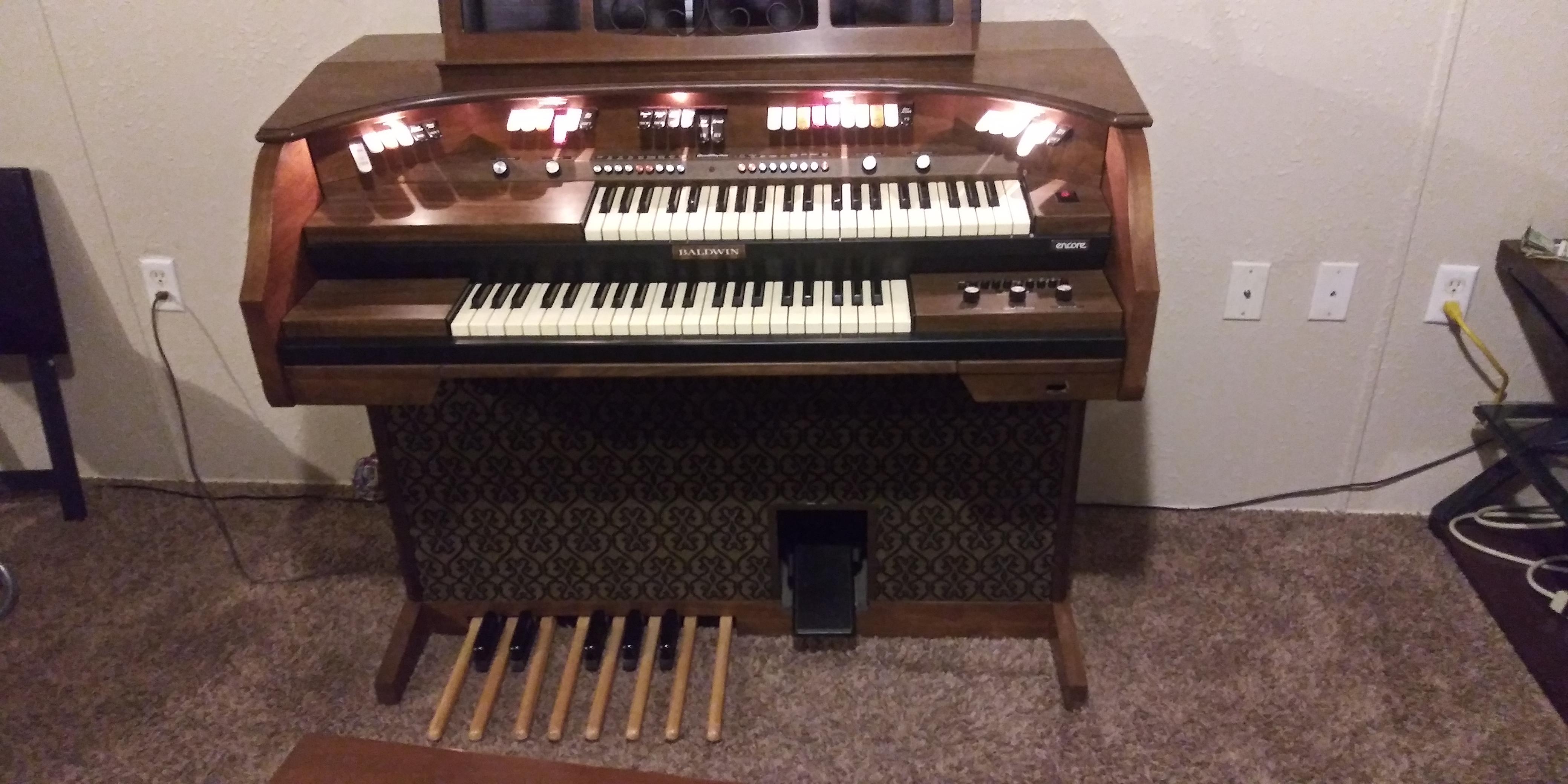 NEED HELP! Just got this organ for free and wondering how much it is