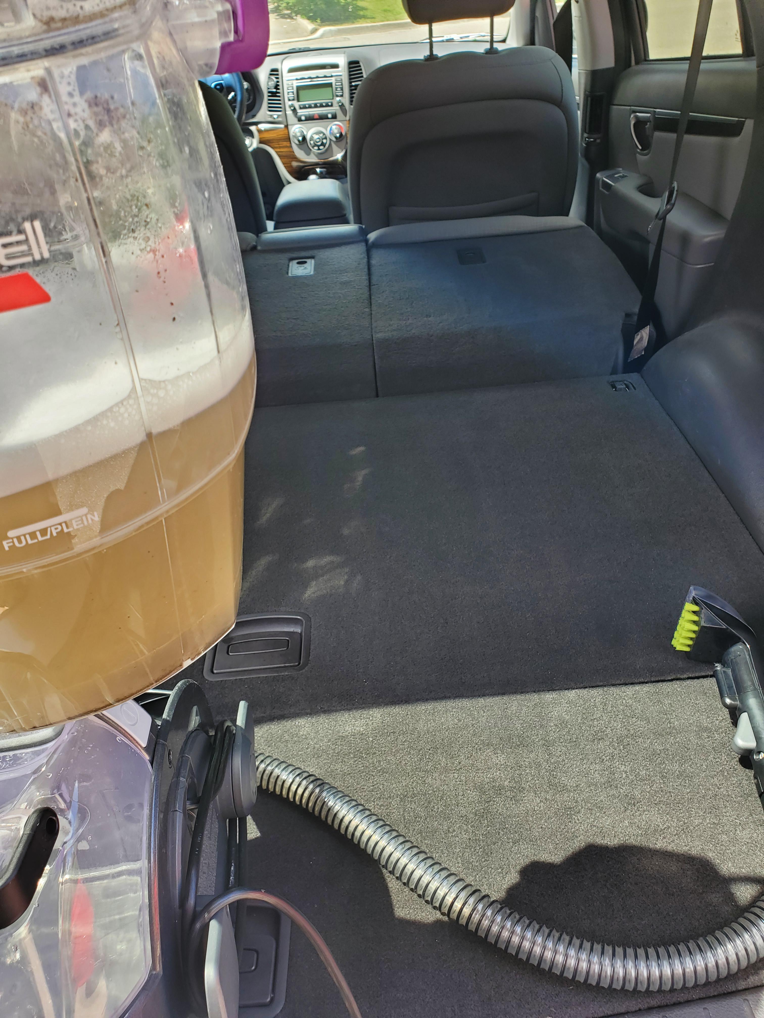 Soaked back seat on Honda civic : Detailing