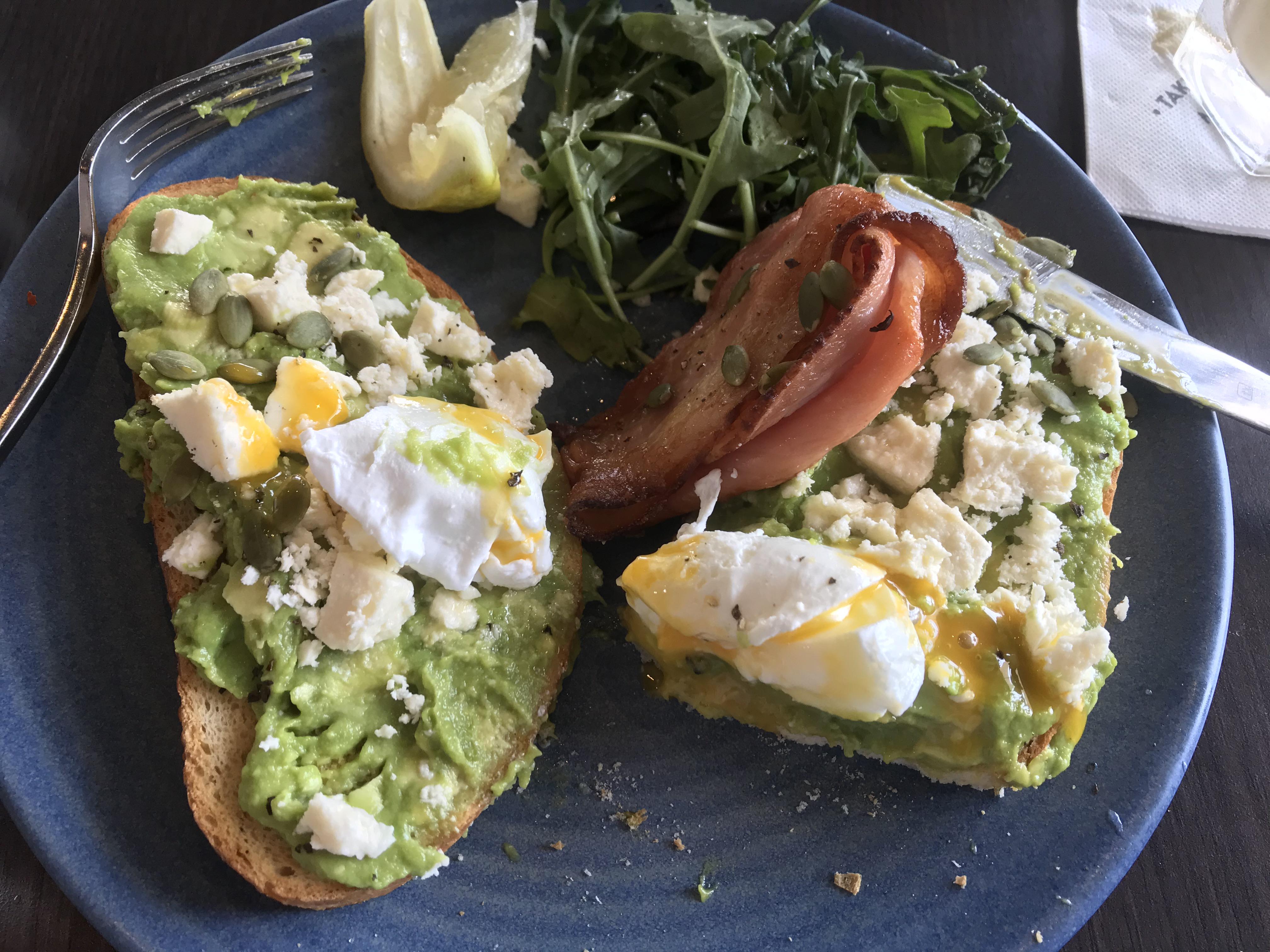 [I ate] Smashed avocado and feta on sourdough toast with bacon, poached