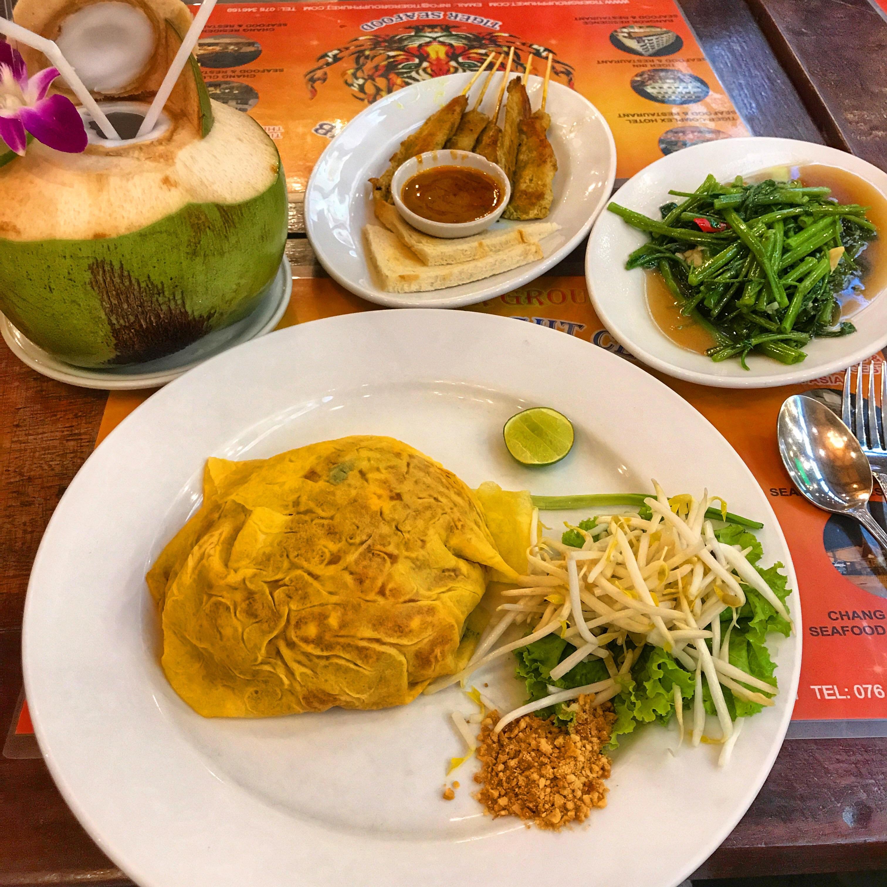 [I ate] Pad Thai wrapped in Egg, Morning Glory, Chicken Satay and some