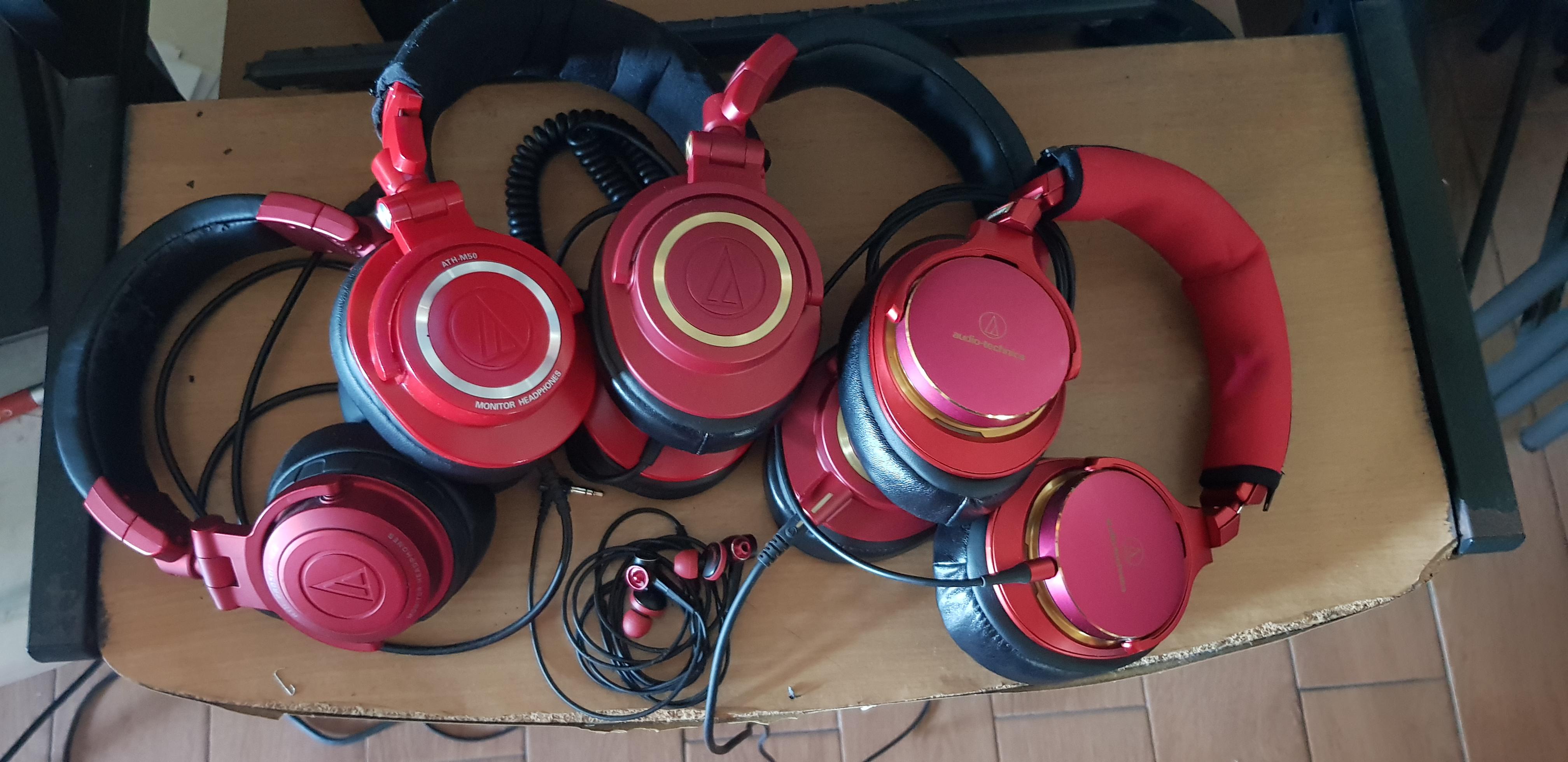 A line up of red audio technica midrange cans r/headphones