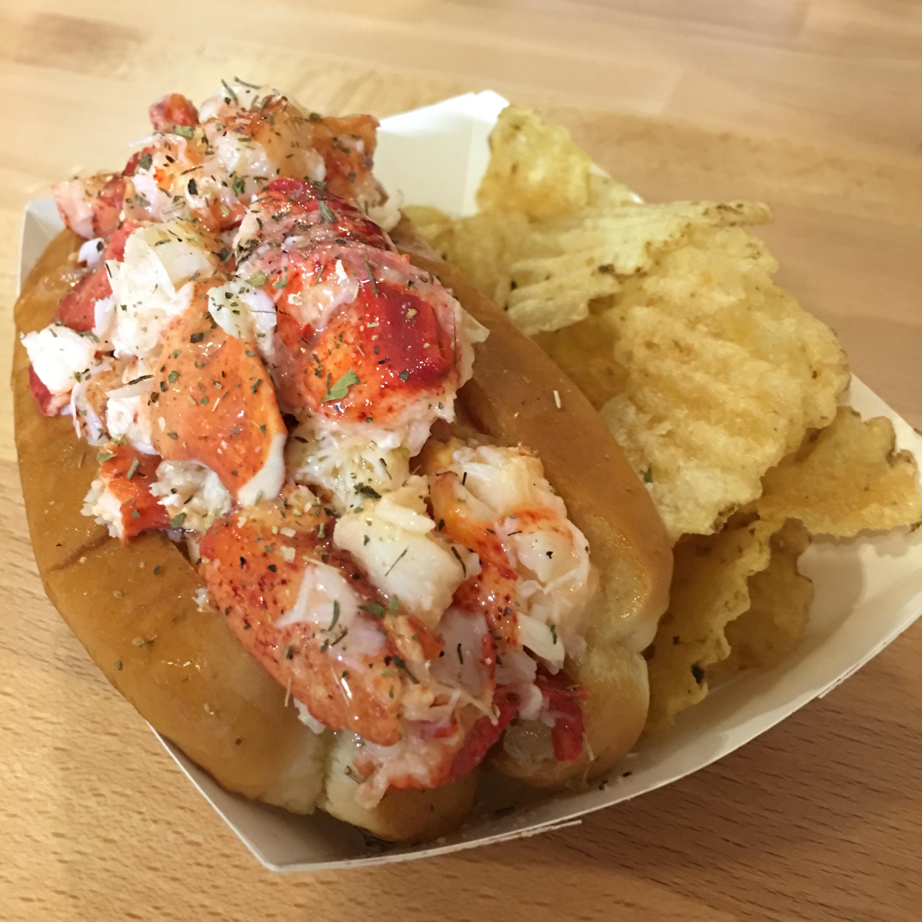 [I ate] a buttery, neverfrozen Maine lobster roll on a toasted New