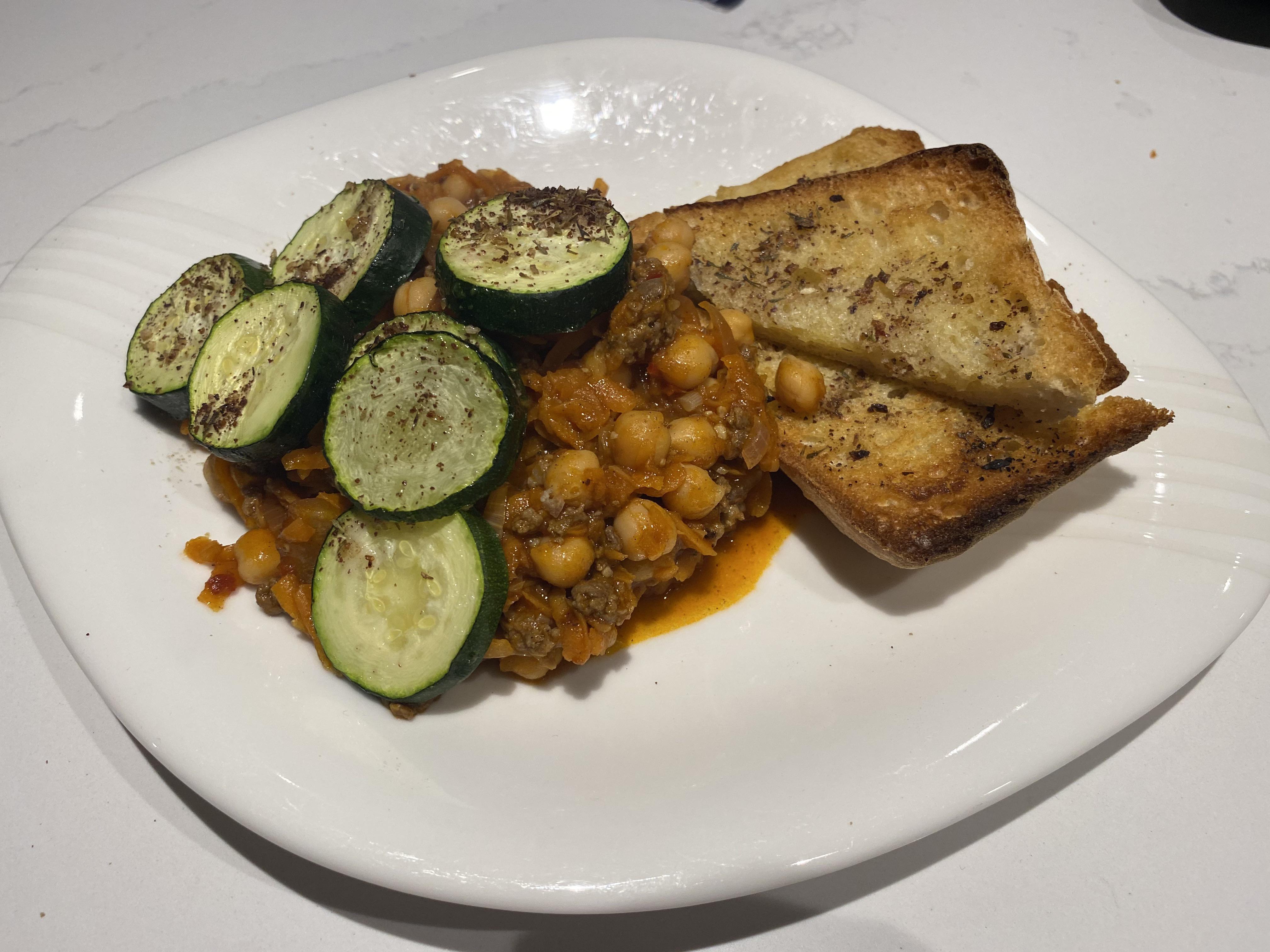 Lamb and chickpea stew with charred courgettes and zaatar ciabatta. I