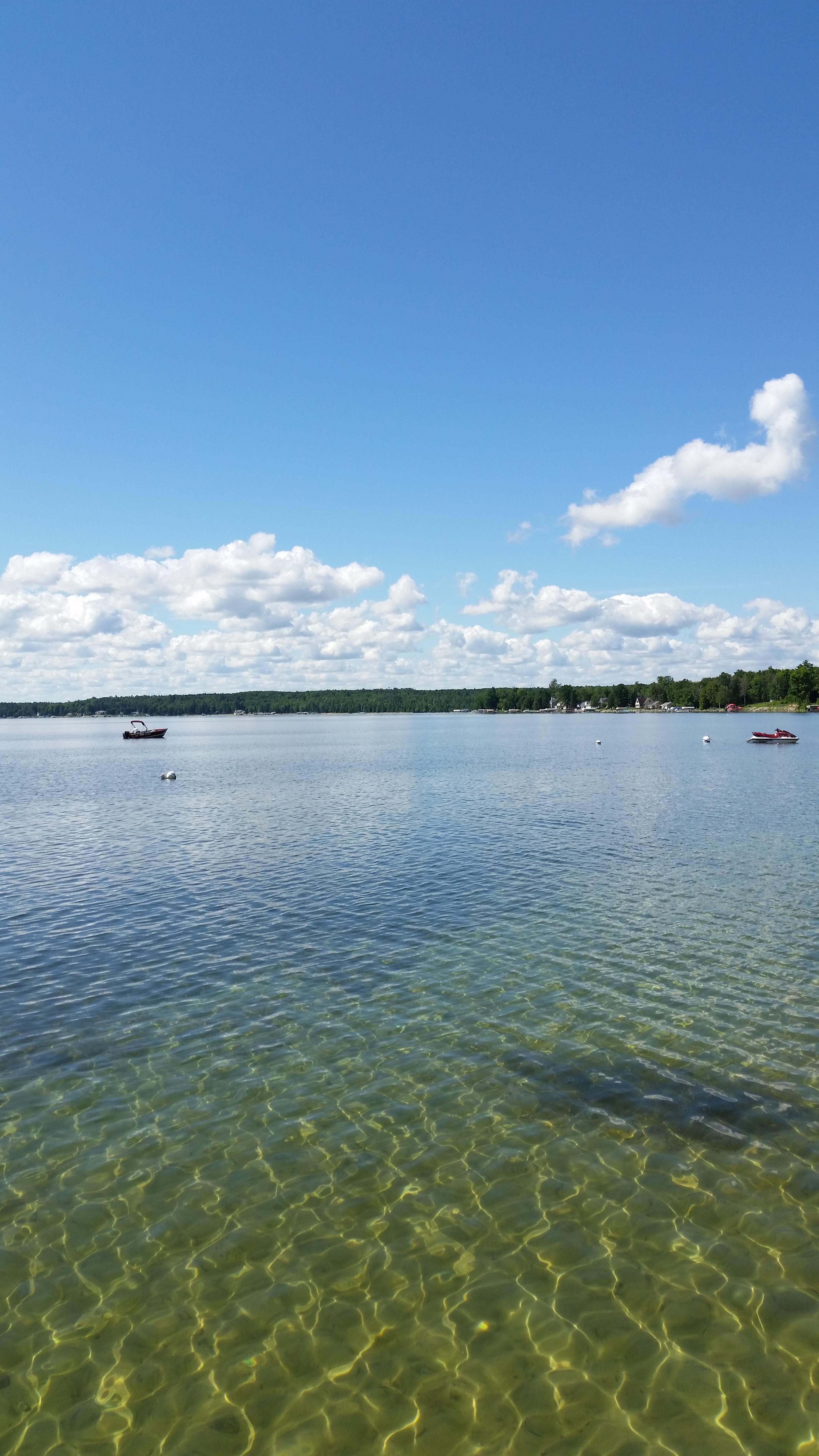 From the dock at Topinabee on Mullett Lake. [OC] r/Michigan