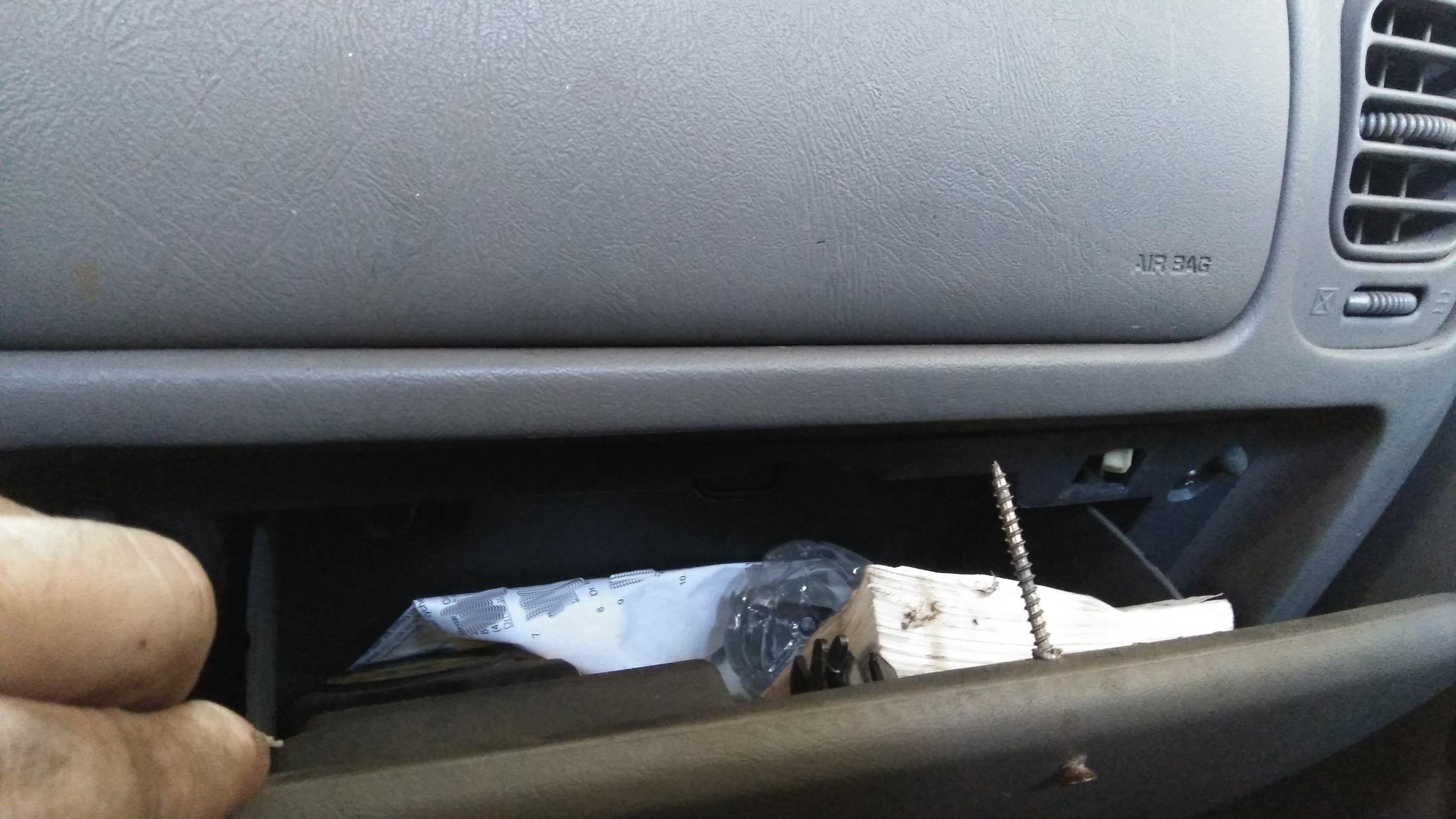 Pretty sure they put a screw though dash, into the airbag to hold the