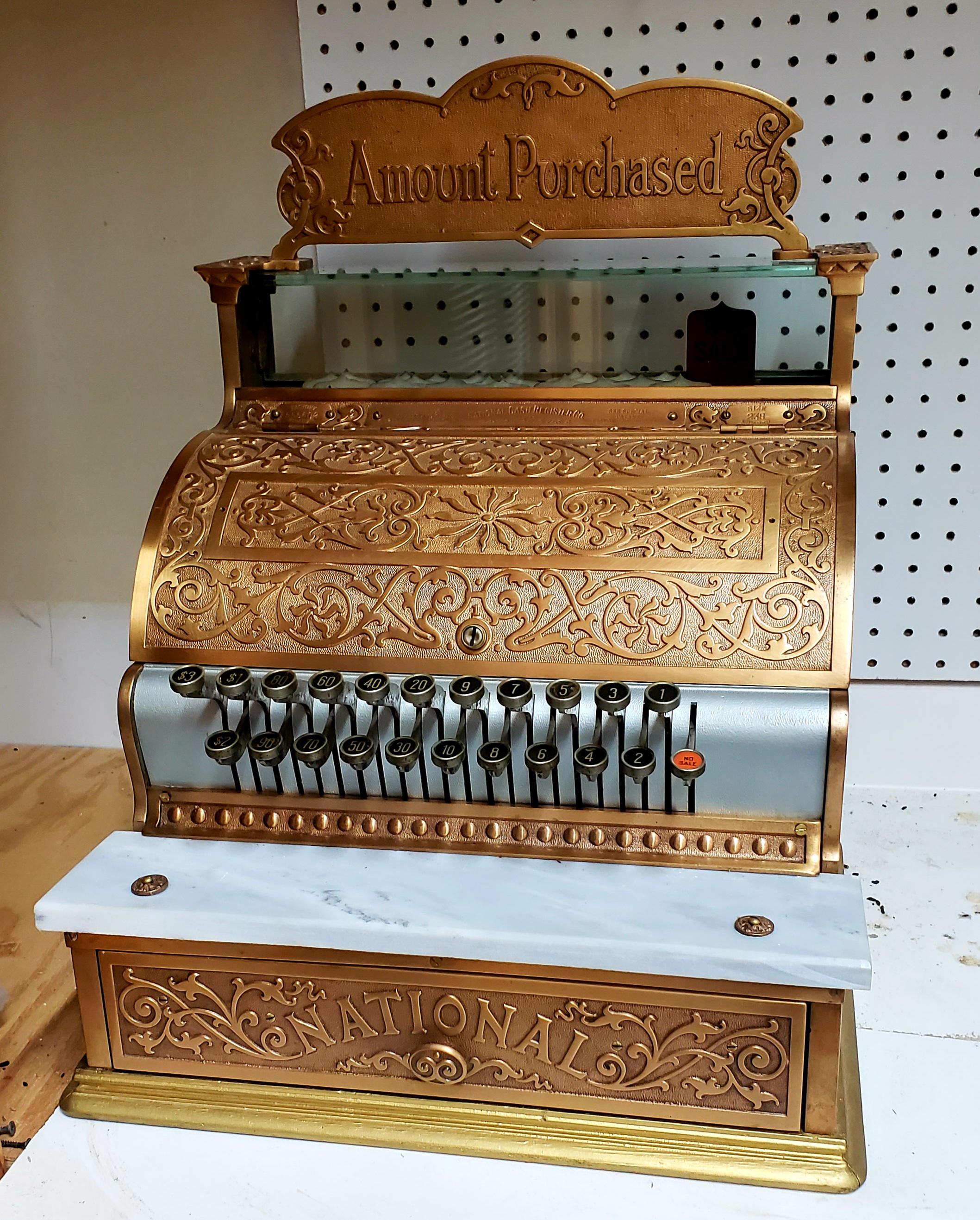 1907 National Cash Register SN 555602 I inherited this and I'd like to consign it but I haven