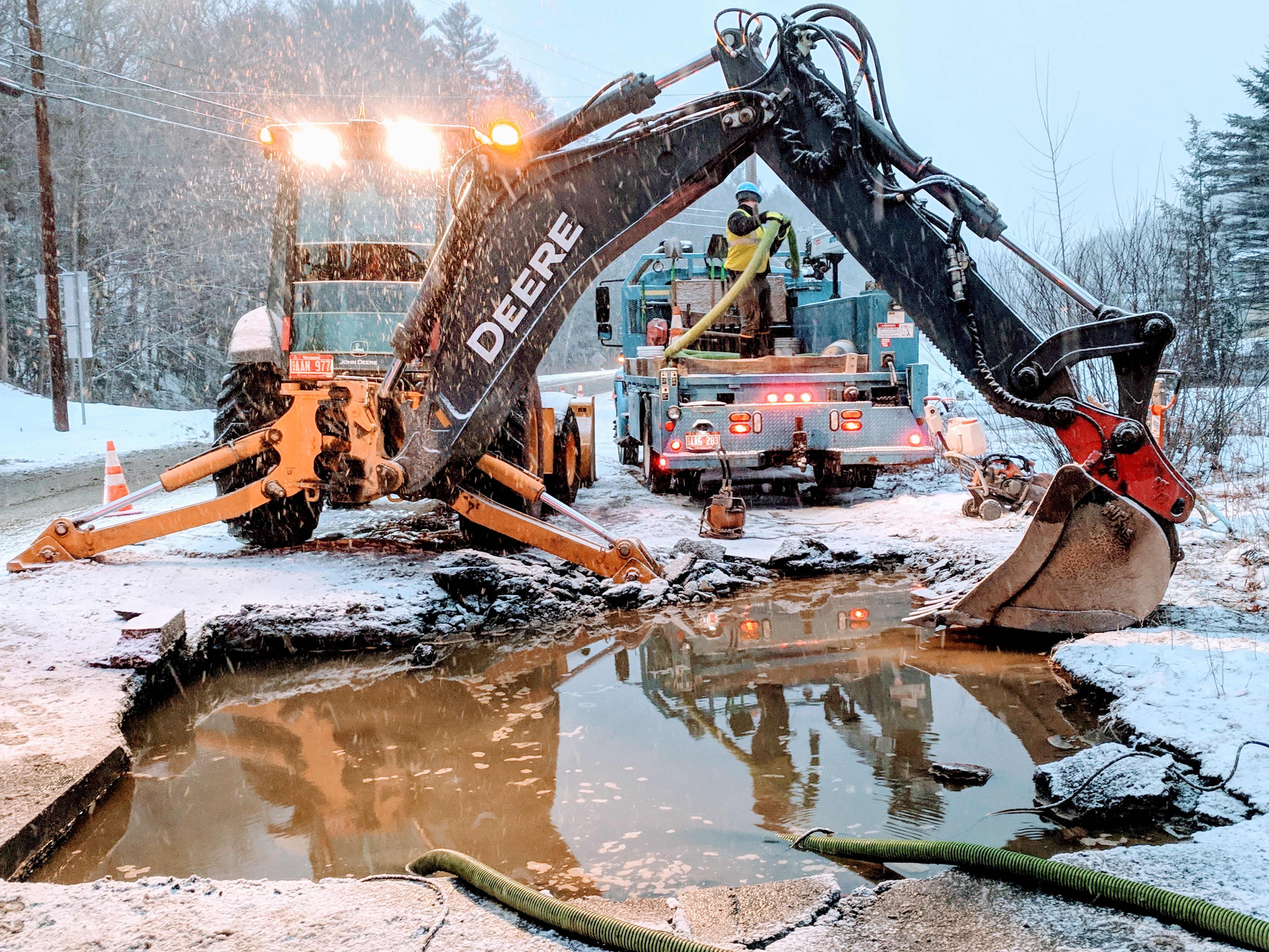 Brattleboro Utilities Division repairing a burst 16in water main under
