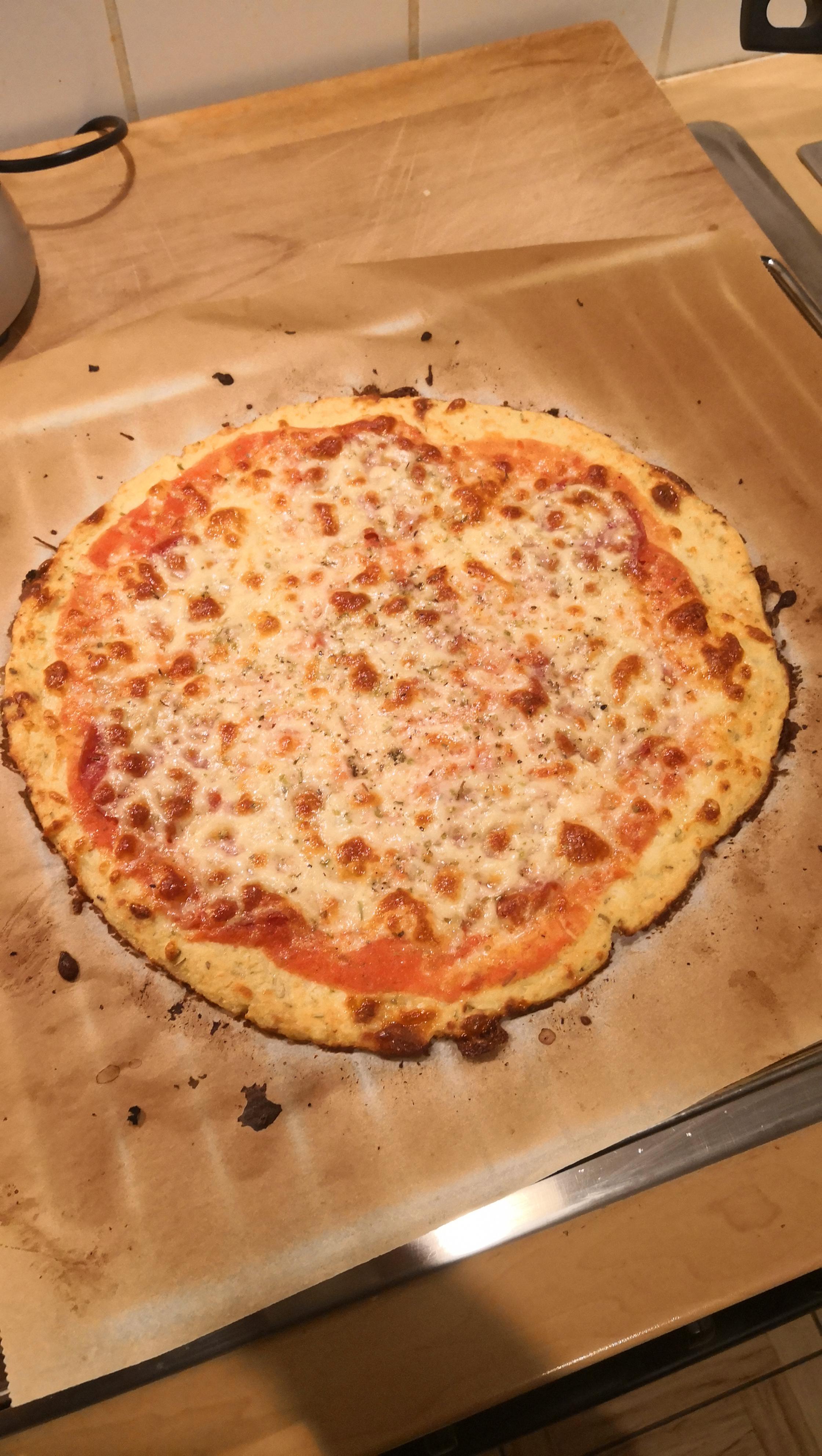 Low carb cauliflower pizza with salami and gouda cheese... Best pizza I