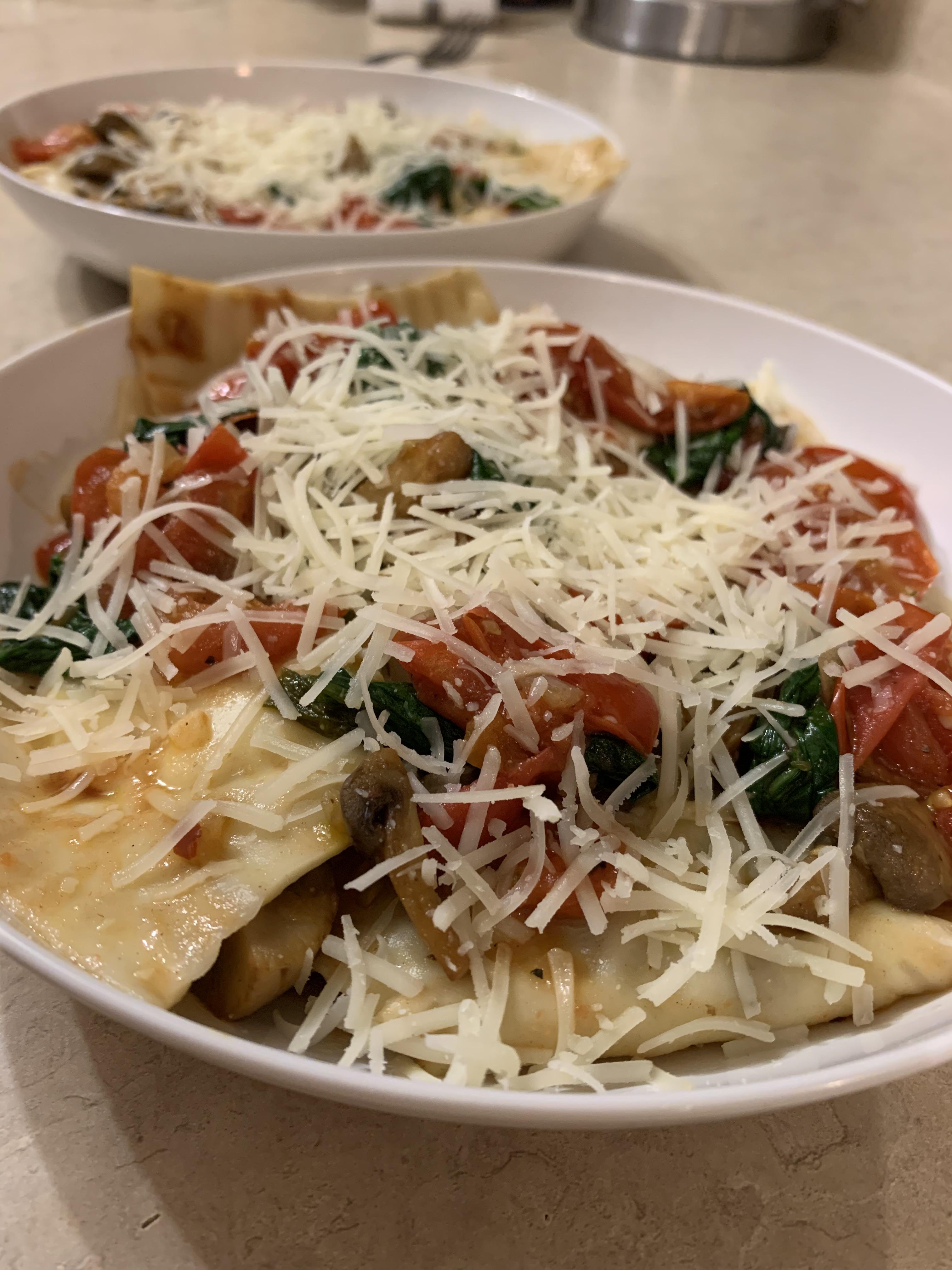 [homemade] mushroom and ricotta ravioli with a cherry tomato sauce r/food