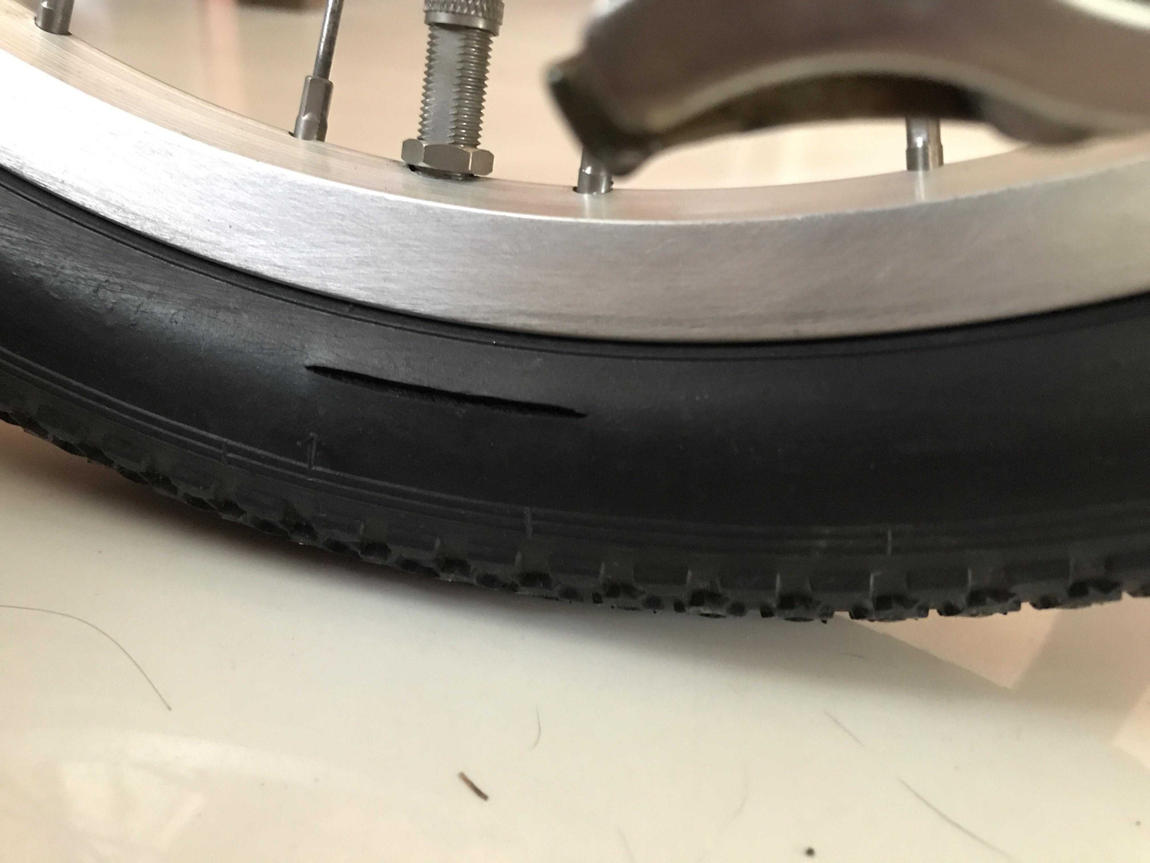 How to fix this kind of hole on my bike tire? The hole is just on the