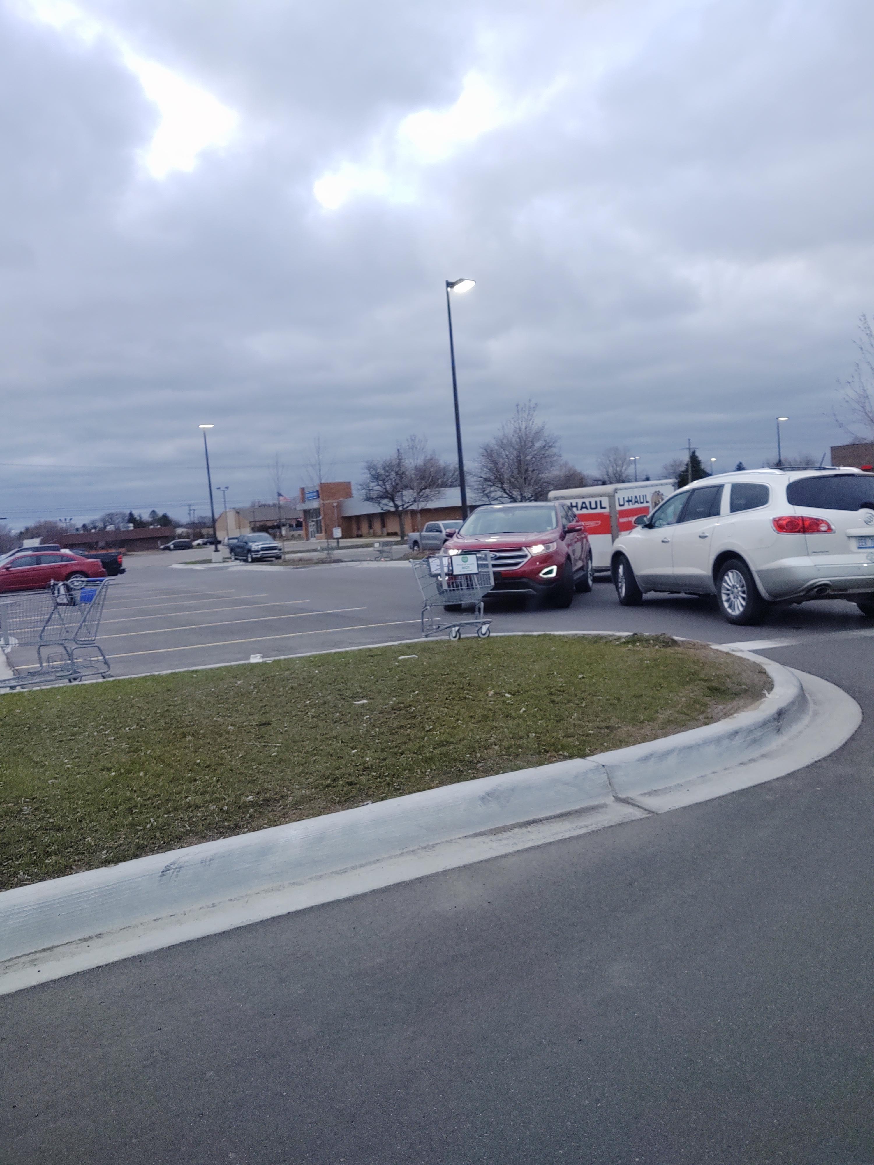 Well, who's going to move? Car turns into car with a trailer turning