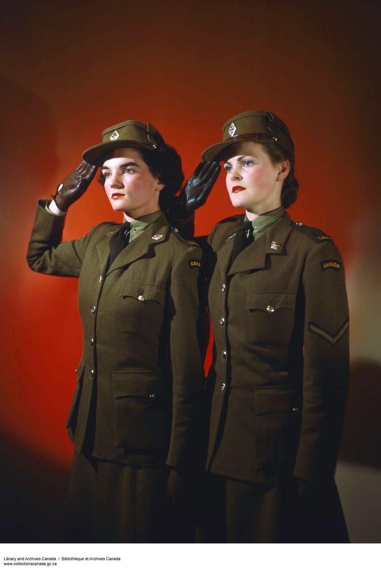 Colorized photograph of two women from the Women’s Army Corp during