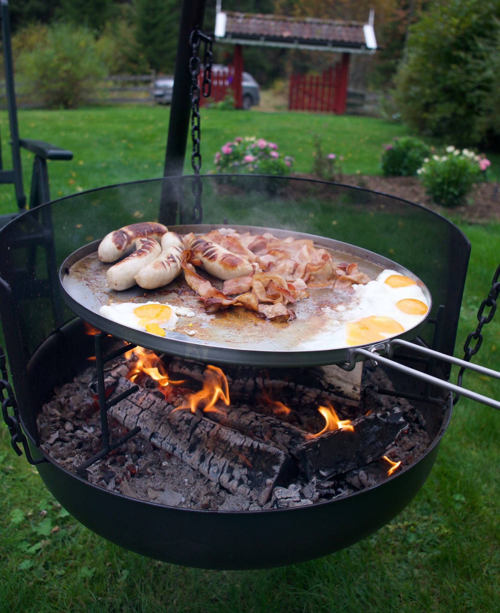 Swiss Sausages, Eggs and Bacon over an Open Fire BBQ Pit [1672x2048