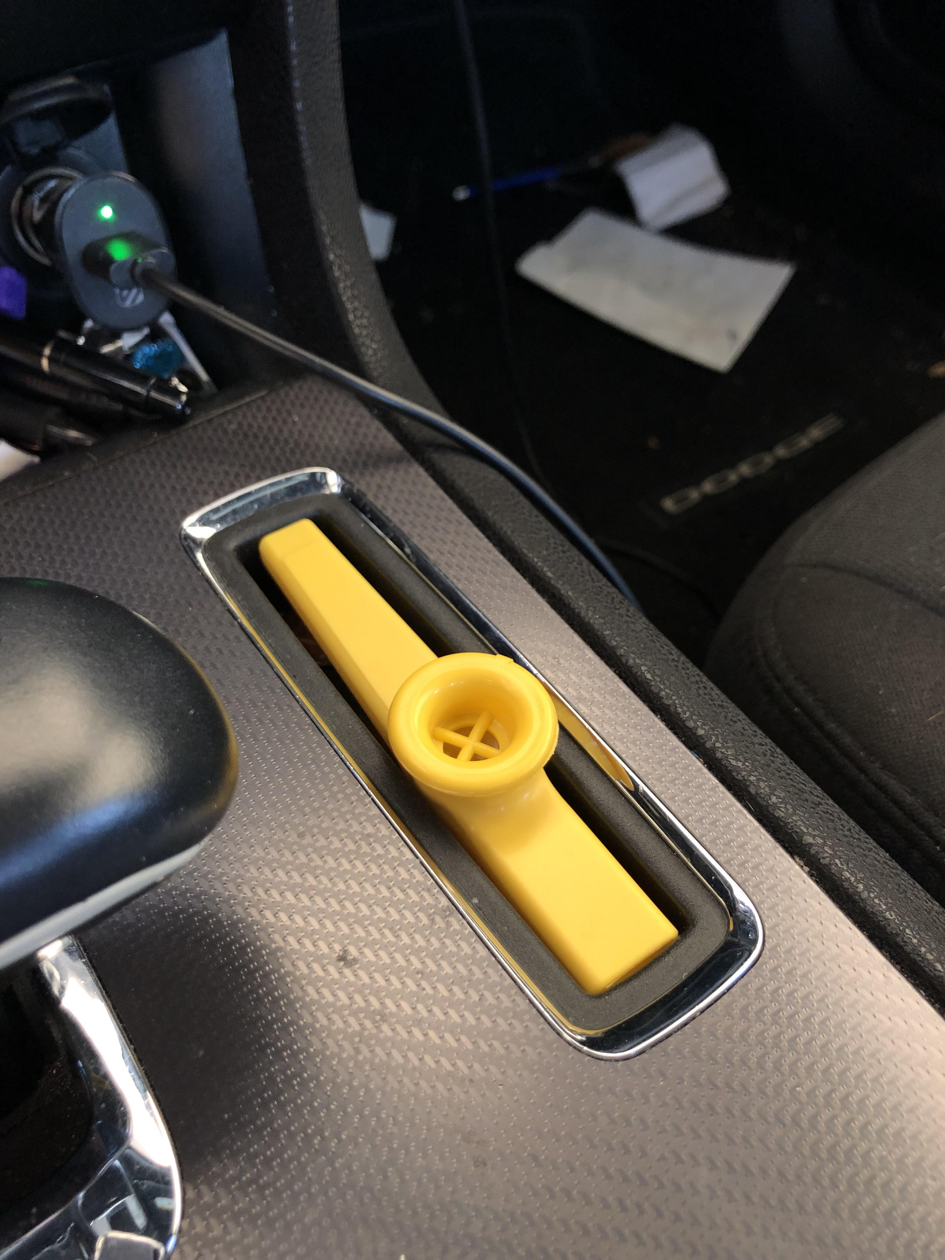 This holder in my car is the length of exactly one kazoo r