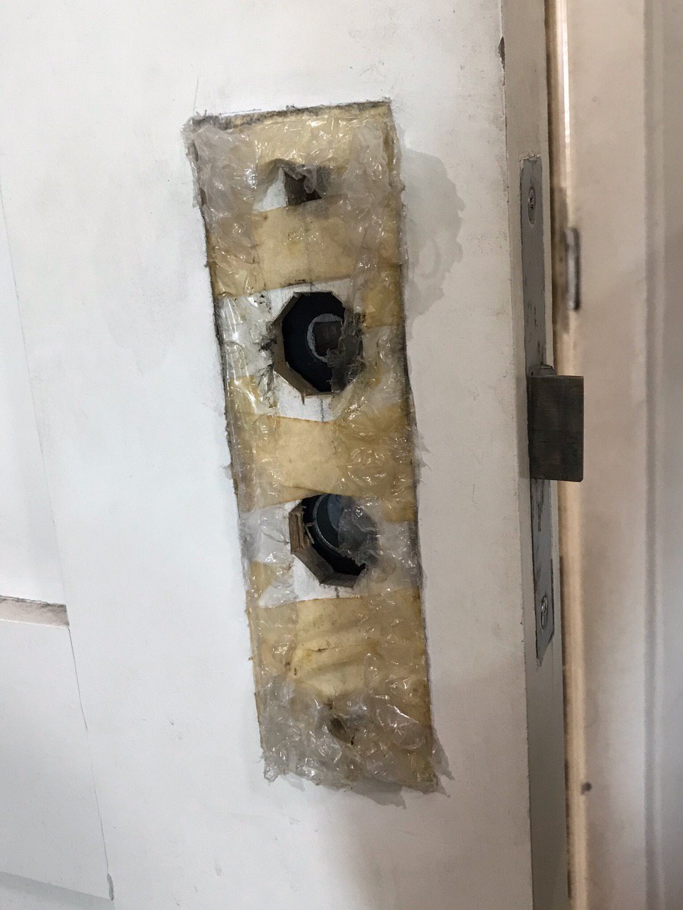 How do you fill in the holes on this solid wood door where the door knob used to be? r/howto