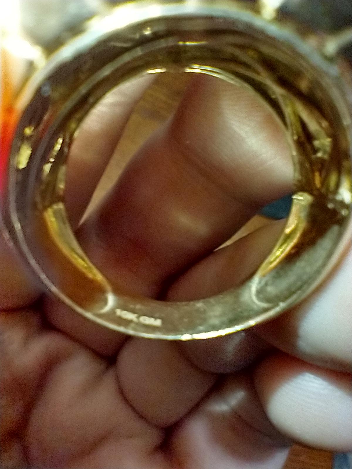 What does the GM stand for? I had gold and diamonds tested. Both are