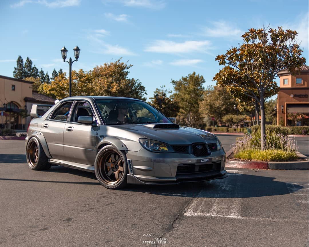 my buddy's flared hawkeye STI r/subaru