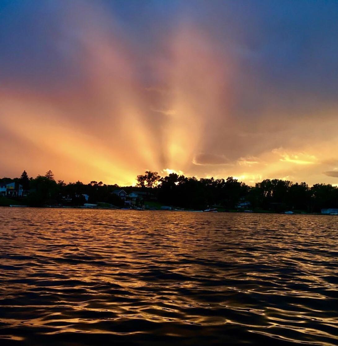 Summer sunset on Woodland lake in Brighton. r/Michigan