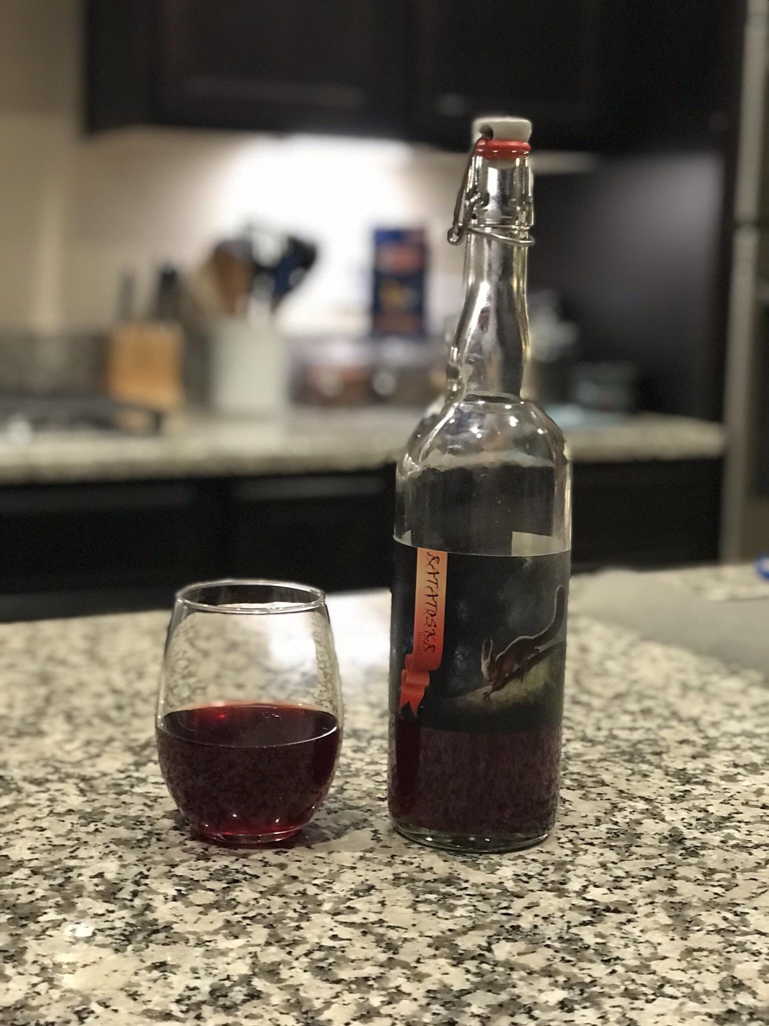 Opening the first bottle of my first brew. Blackberry melomel. r/mead