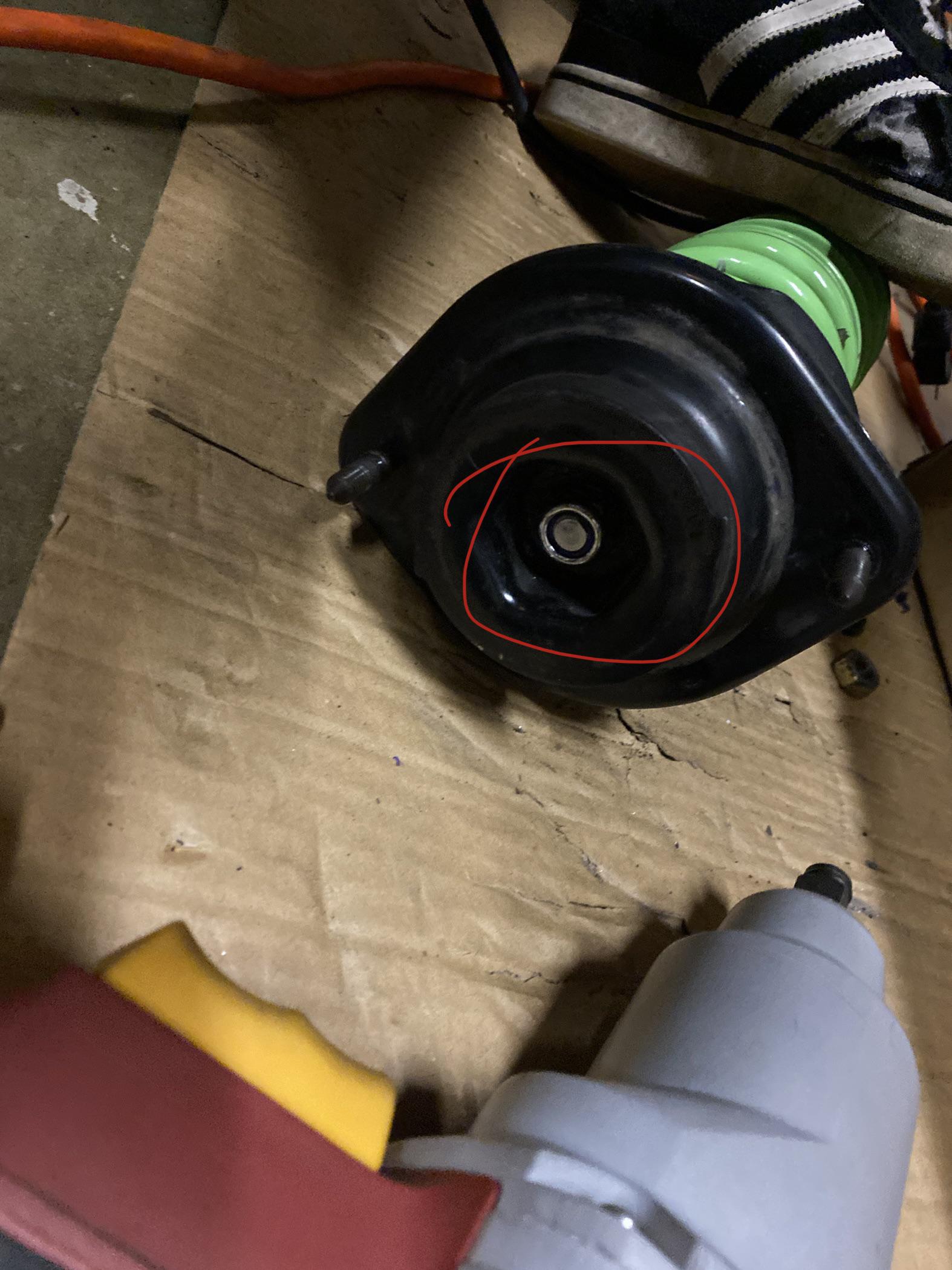 Center nut keeps spinning with strut shaft. D shaped hole along with D shaped strut shaft stud