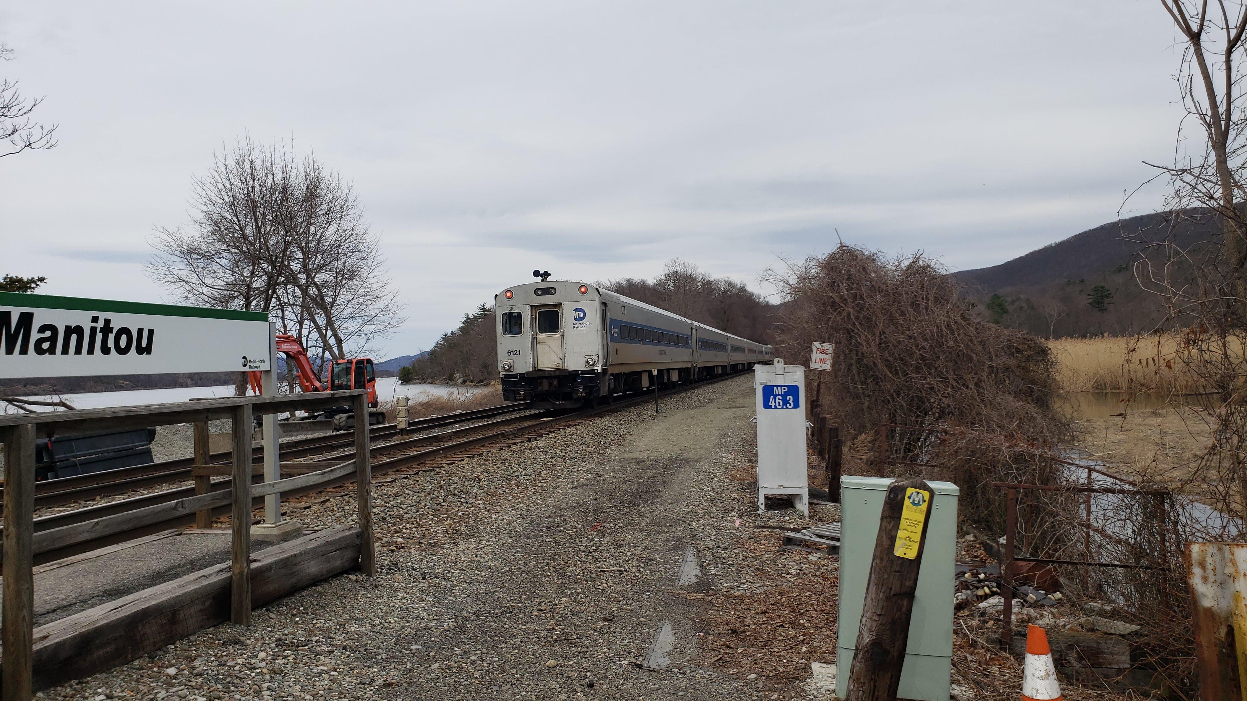 PoughkeepsieBound train of Shoreliners hauled by a Genesis P32 passes