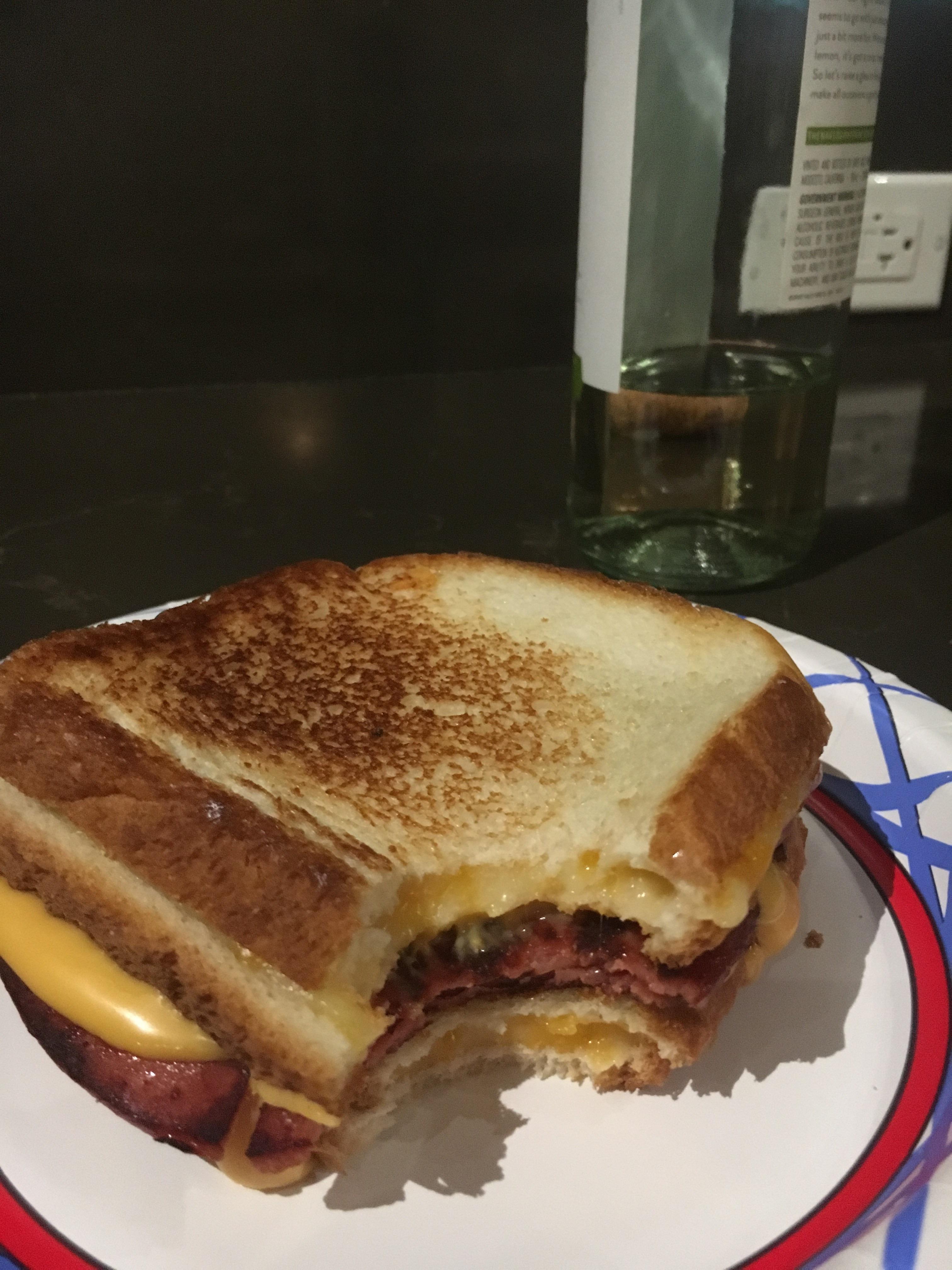 Fried bologna sandwich with grilled cheeses for the bread r