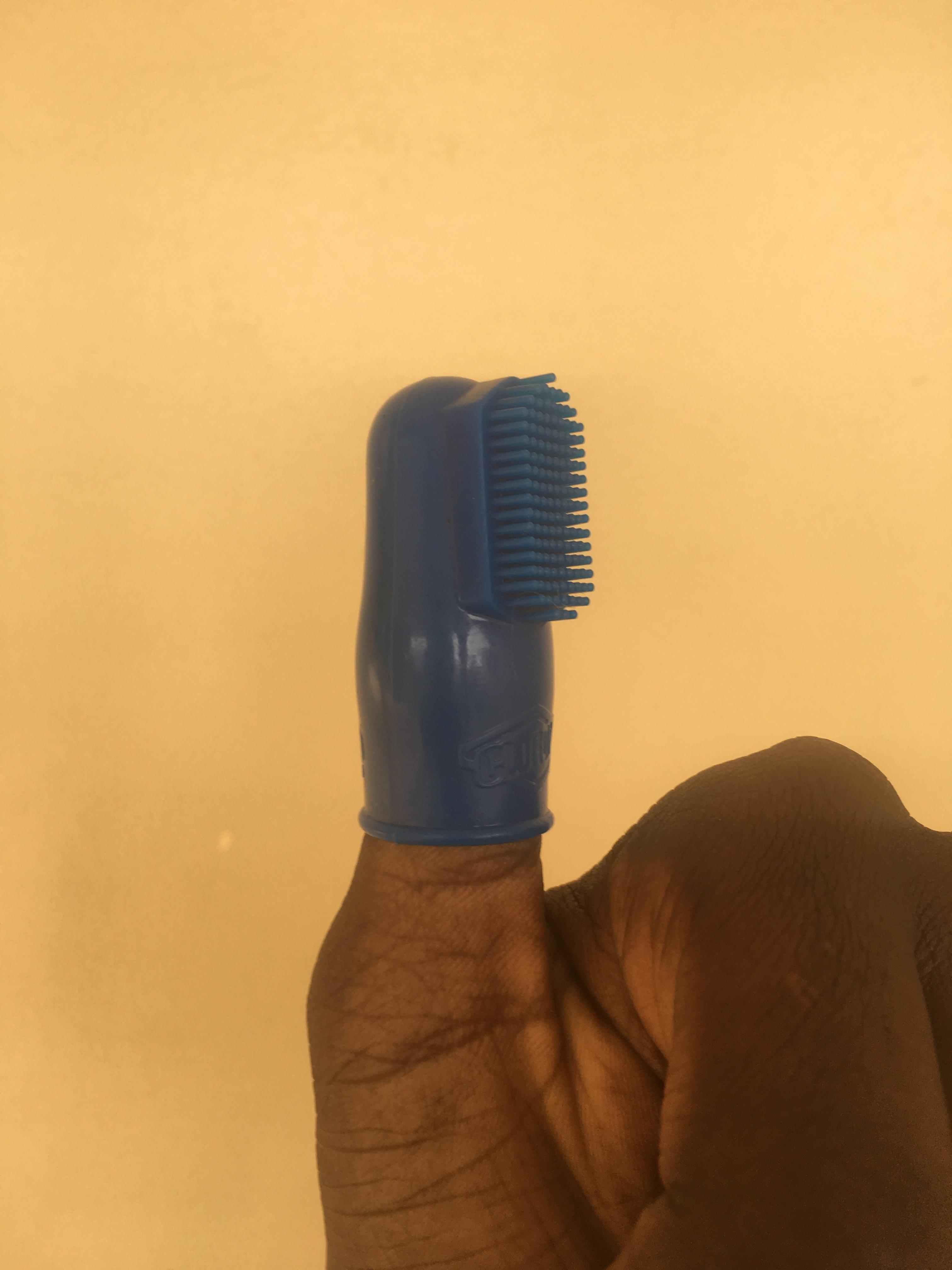 This cool finger brush that lets so you can scrub where the brush can’t