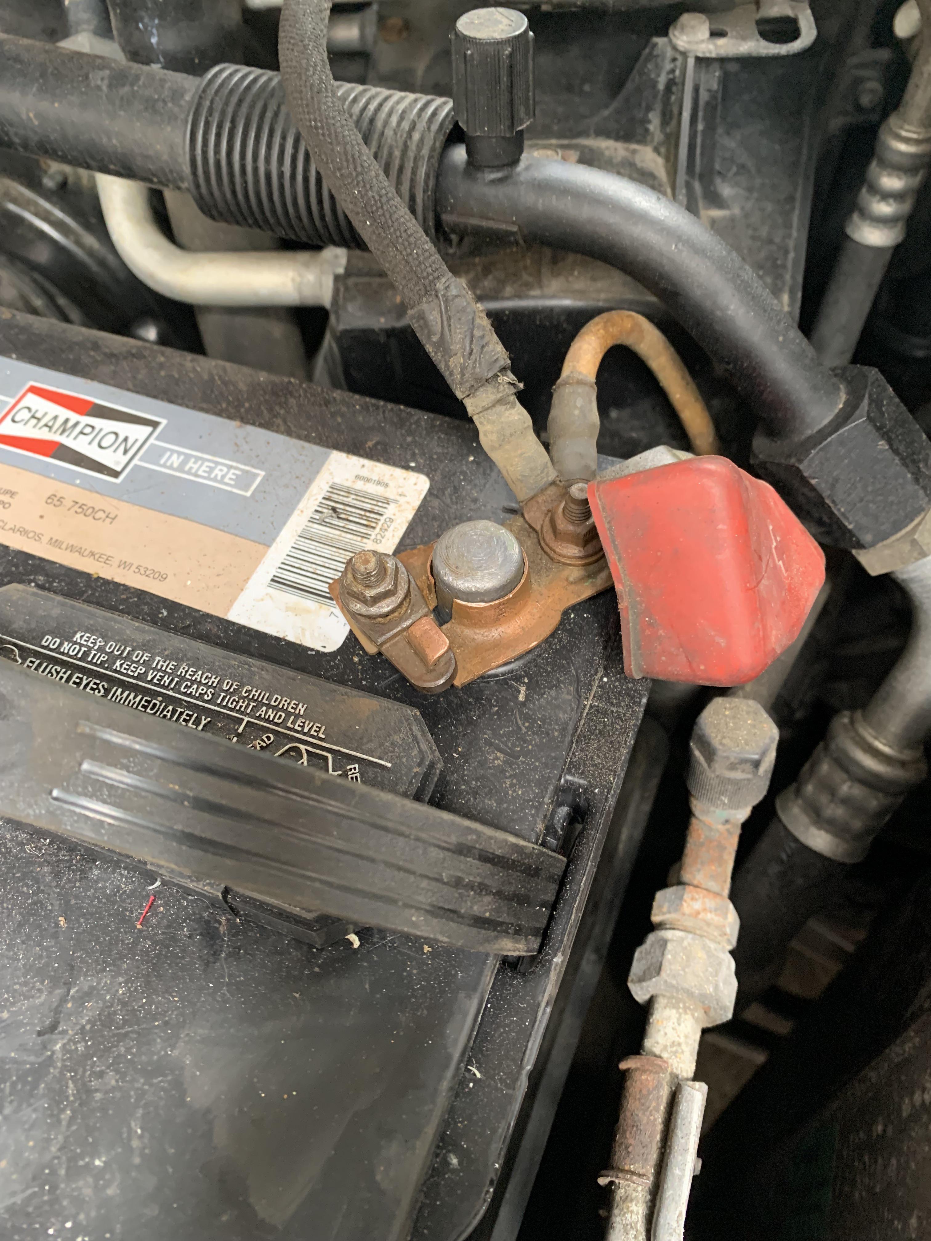 Nut/bolt stripped on battery clamp. Temp safe fix for trip? Does
