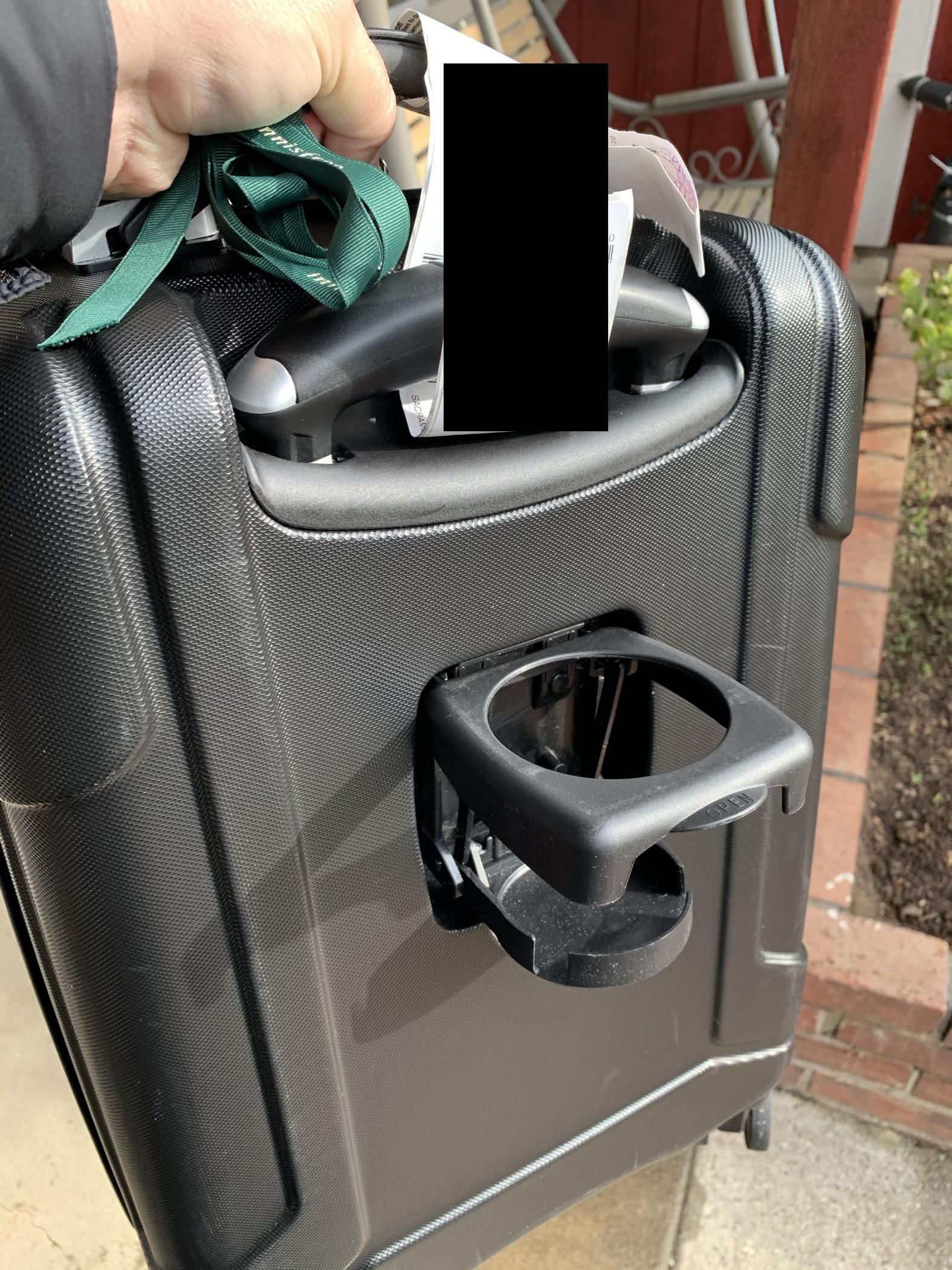 This rolling suitcase has a cup holder r/mildlyinteresting