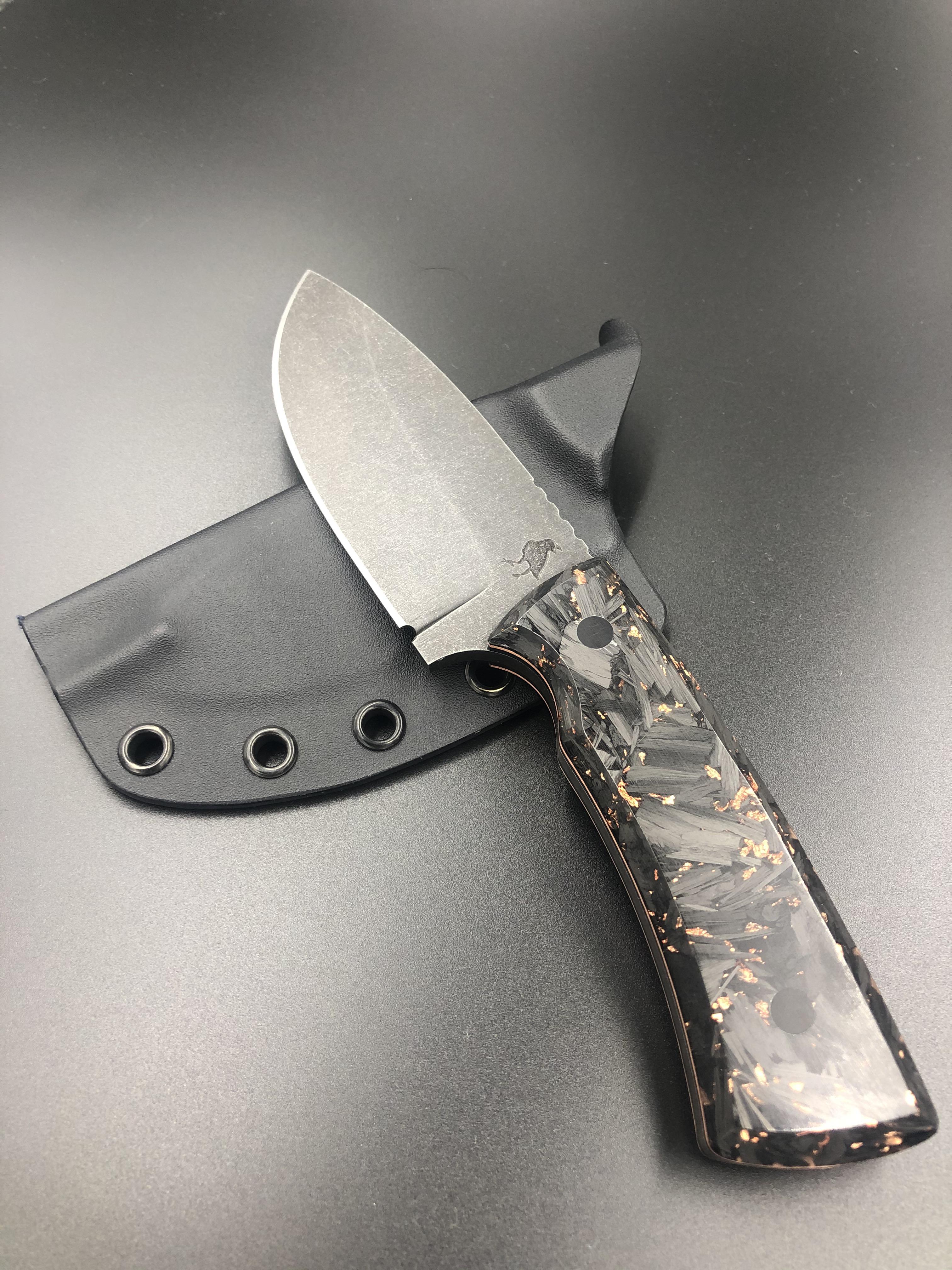80CRV2 Drop Point. Carbon fiber/ copper flake handles. Copper/ Black