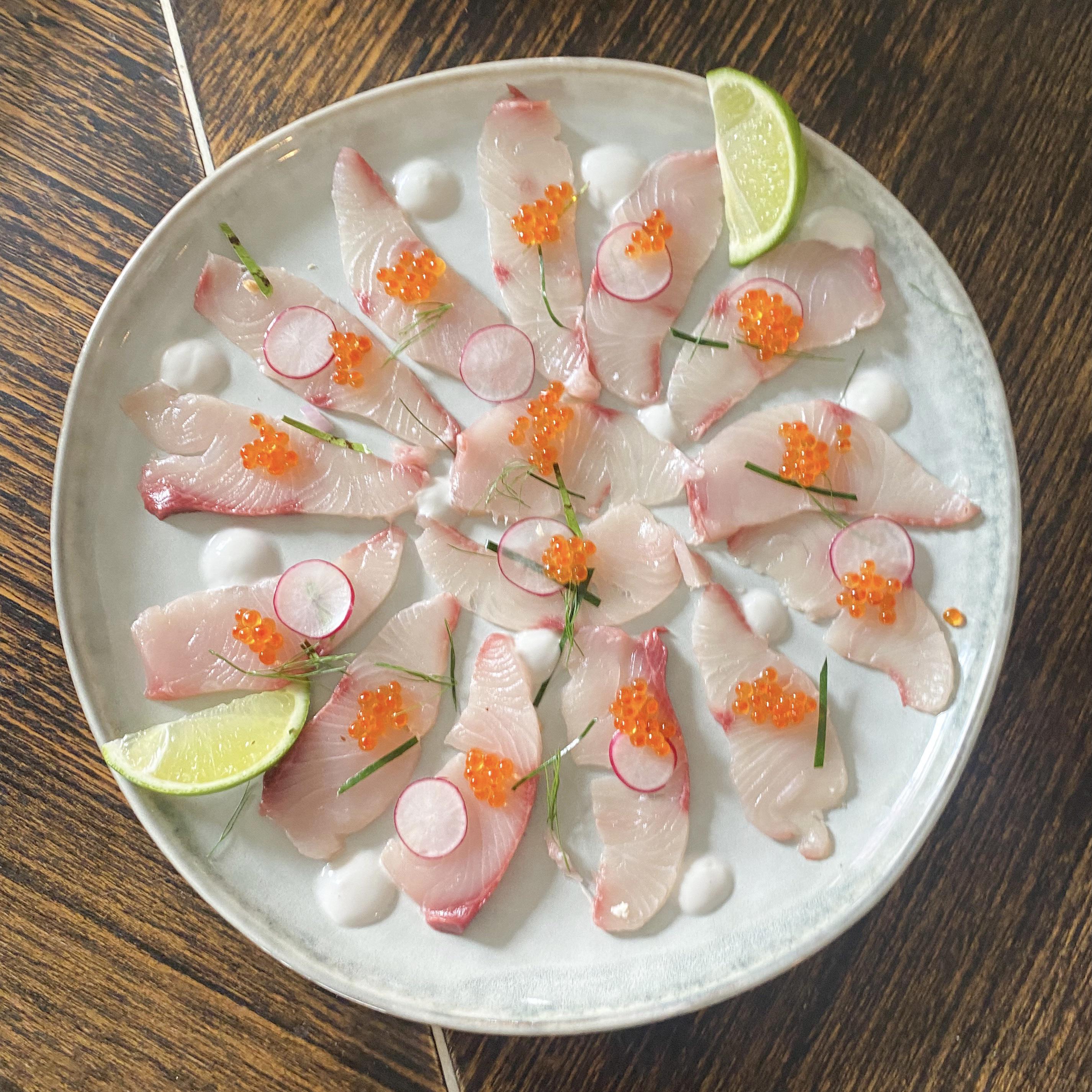 [homemade] kingfish sashimi with salmon caviar, raddish, coconut lime