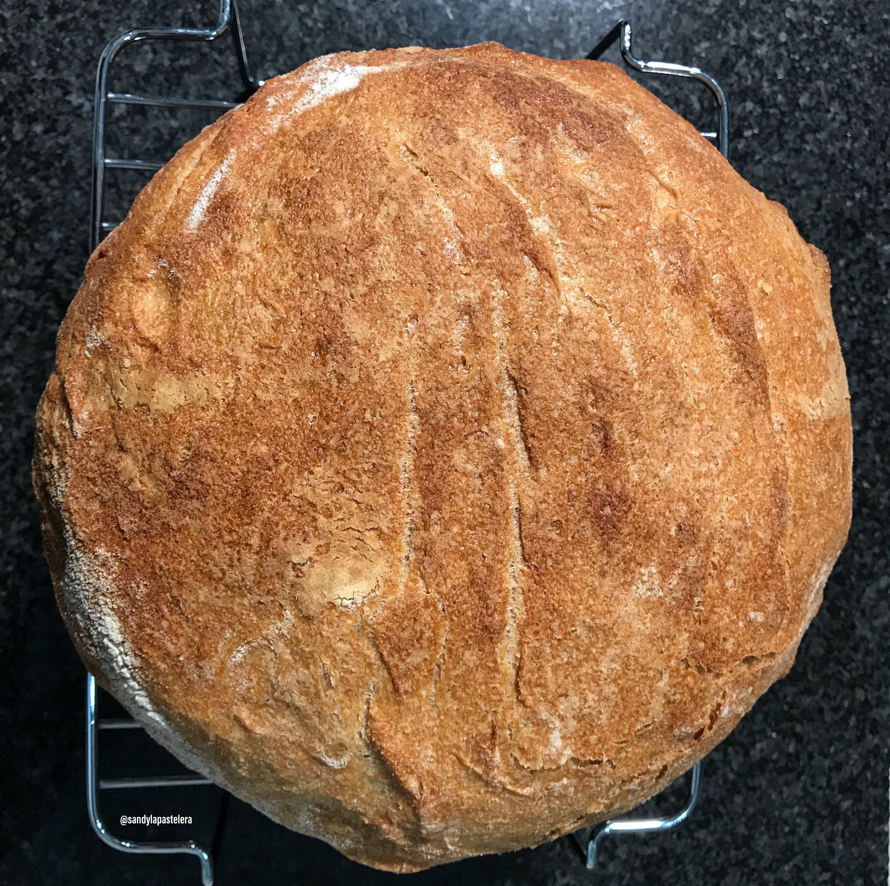 My second homemade Sourdough Bread bakes in a Dutch oven r/ArtisanBread