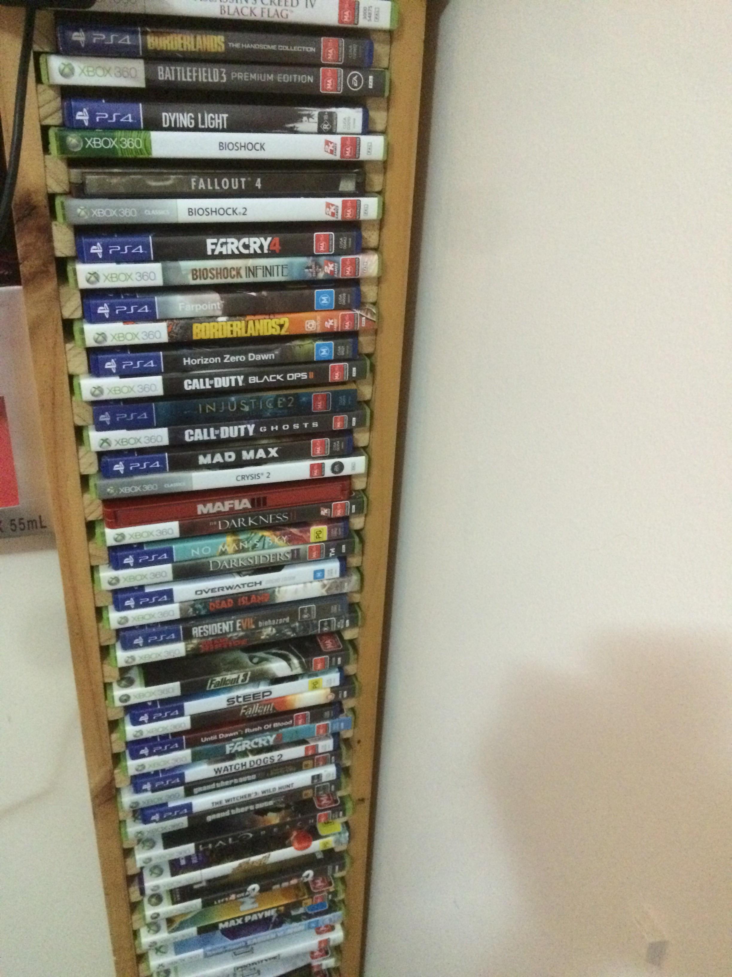 Thought you guys might like this (crappy) Xbox 360 game stand I made in woodwork that by pure