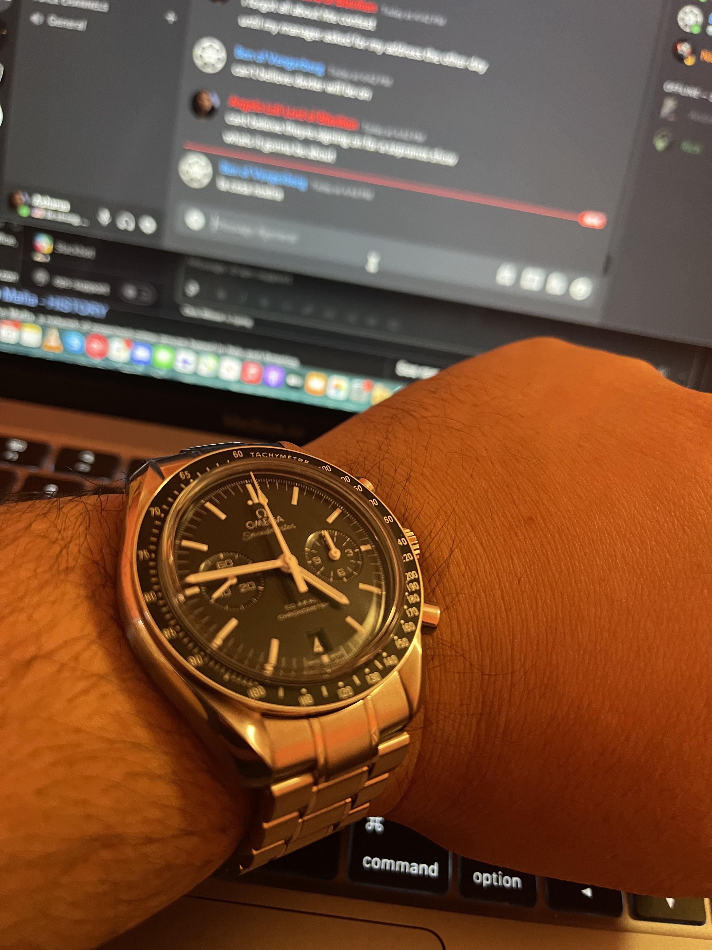 [Omega Speedmaster Moonwatch] with an automatic movement and date wheel