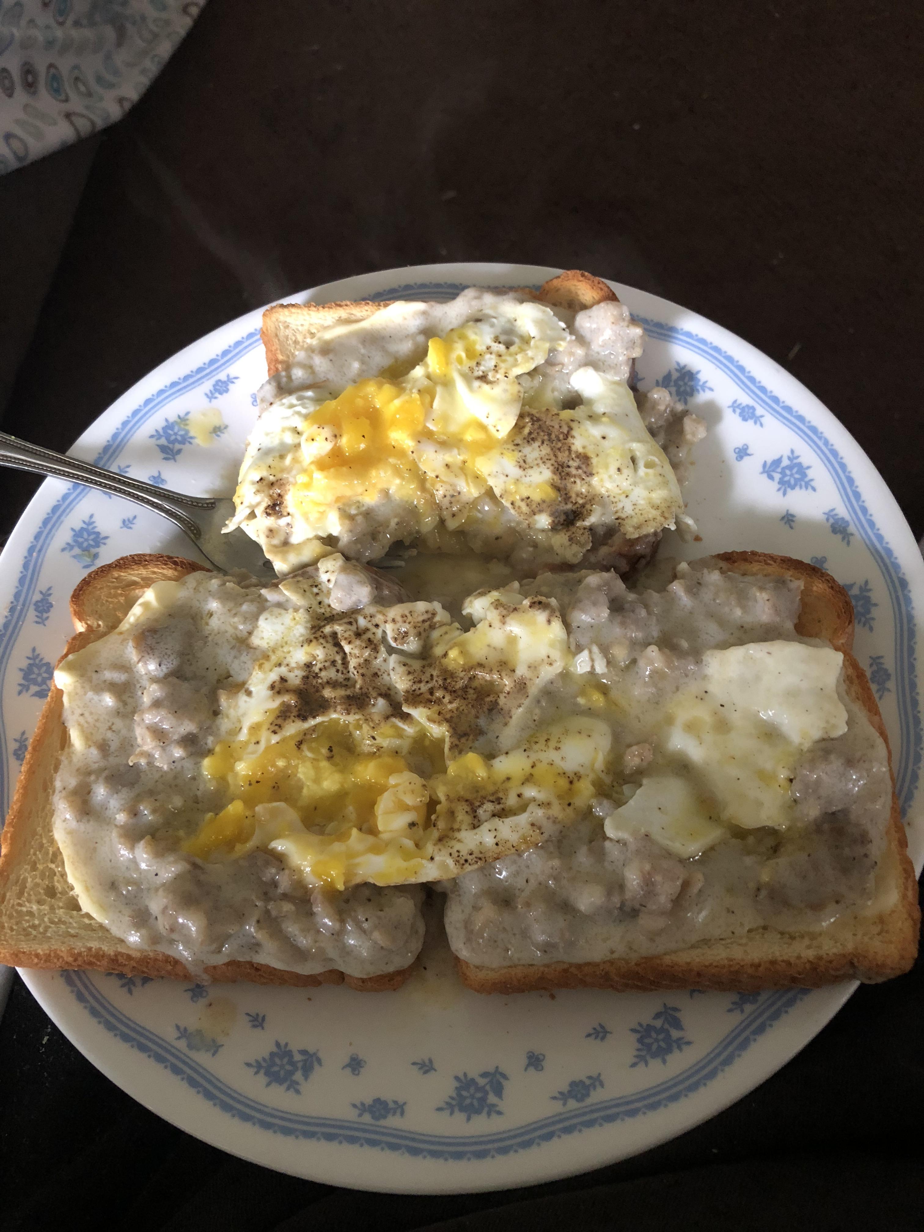 Sausage gravy on toast with fried eggs r/shittyfoodporn