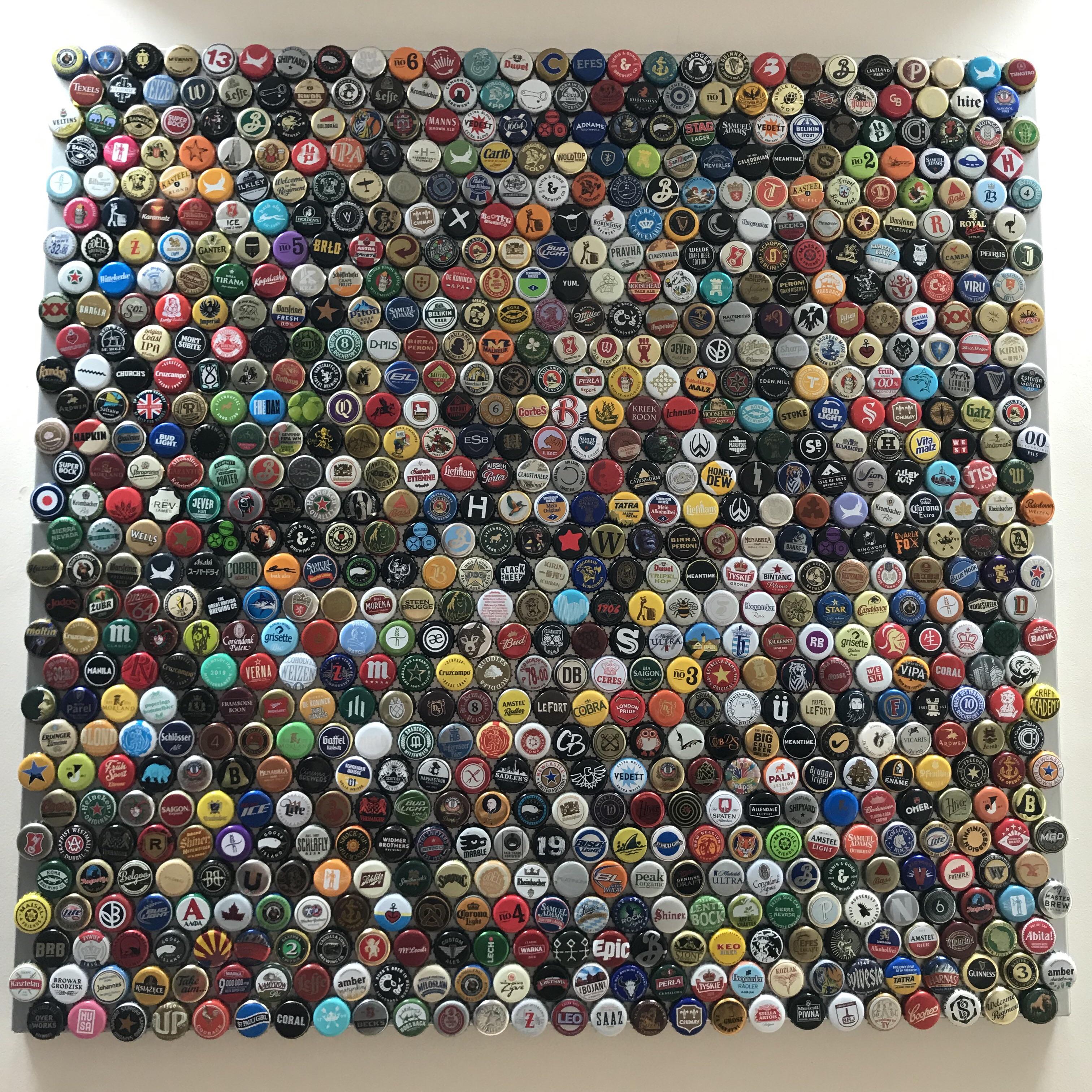 795 unique beer caps, a little under two years worth of collecting.......... time to mount a new