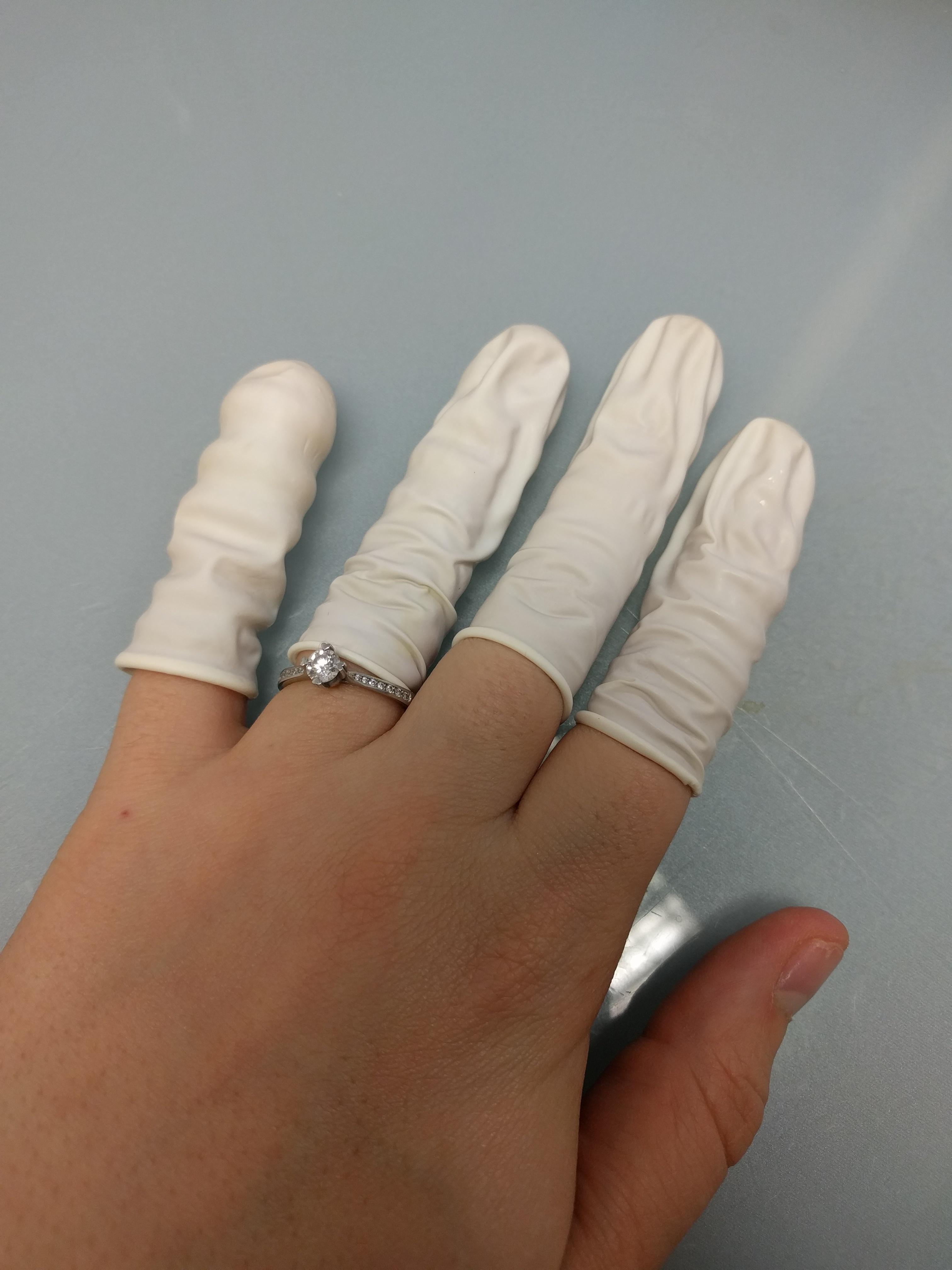 Trying to break a 15year nail biting habit by wearing mini condoms on