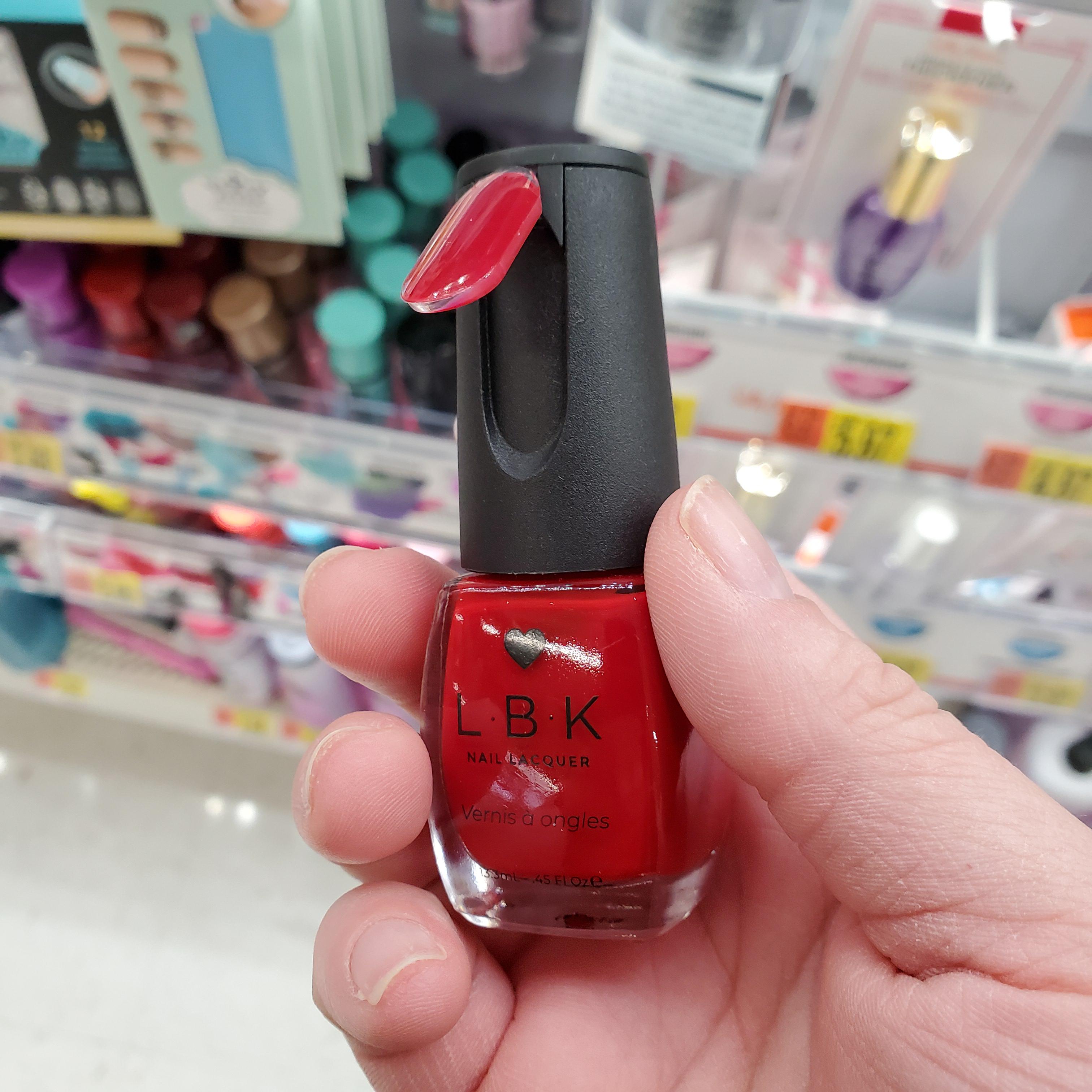 Nail polish bottle has a swatch of the colour attached to the bottle so