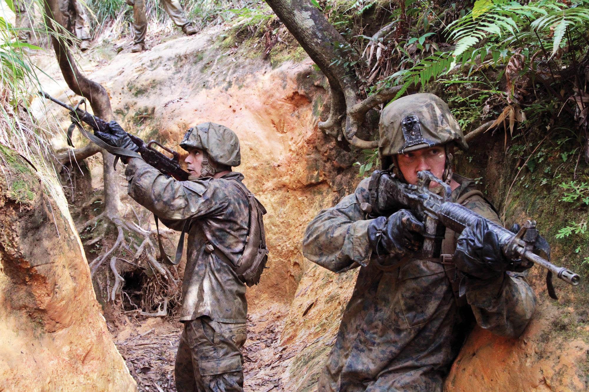 U.S. Marines training at the Jungle Warfare Training Center on Camp