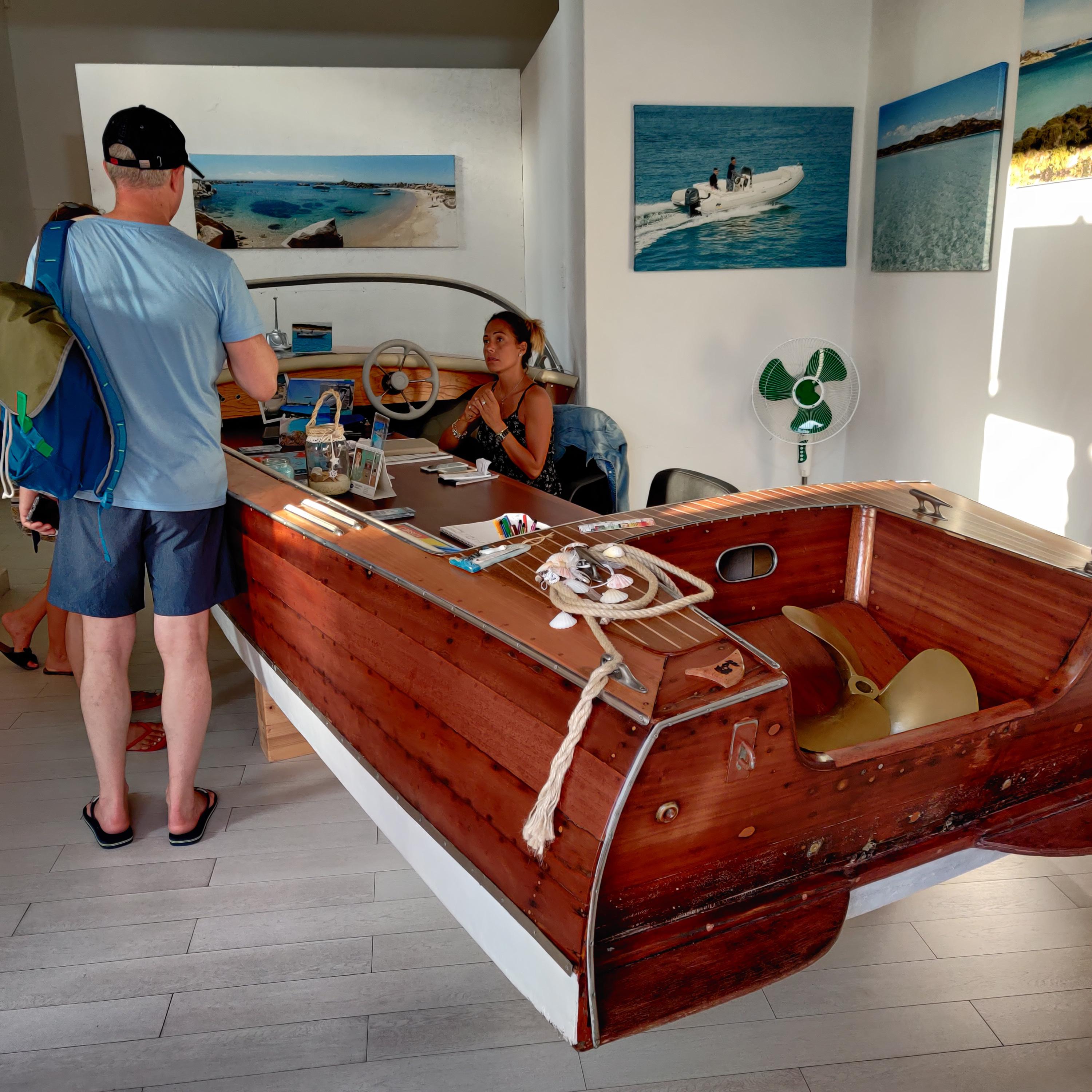 Boat rental service uses speedboat as desk r/mildlyinteresting