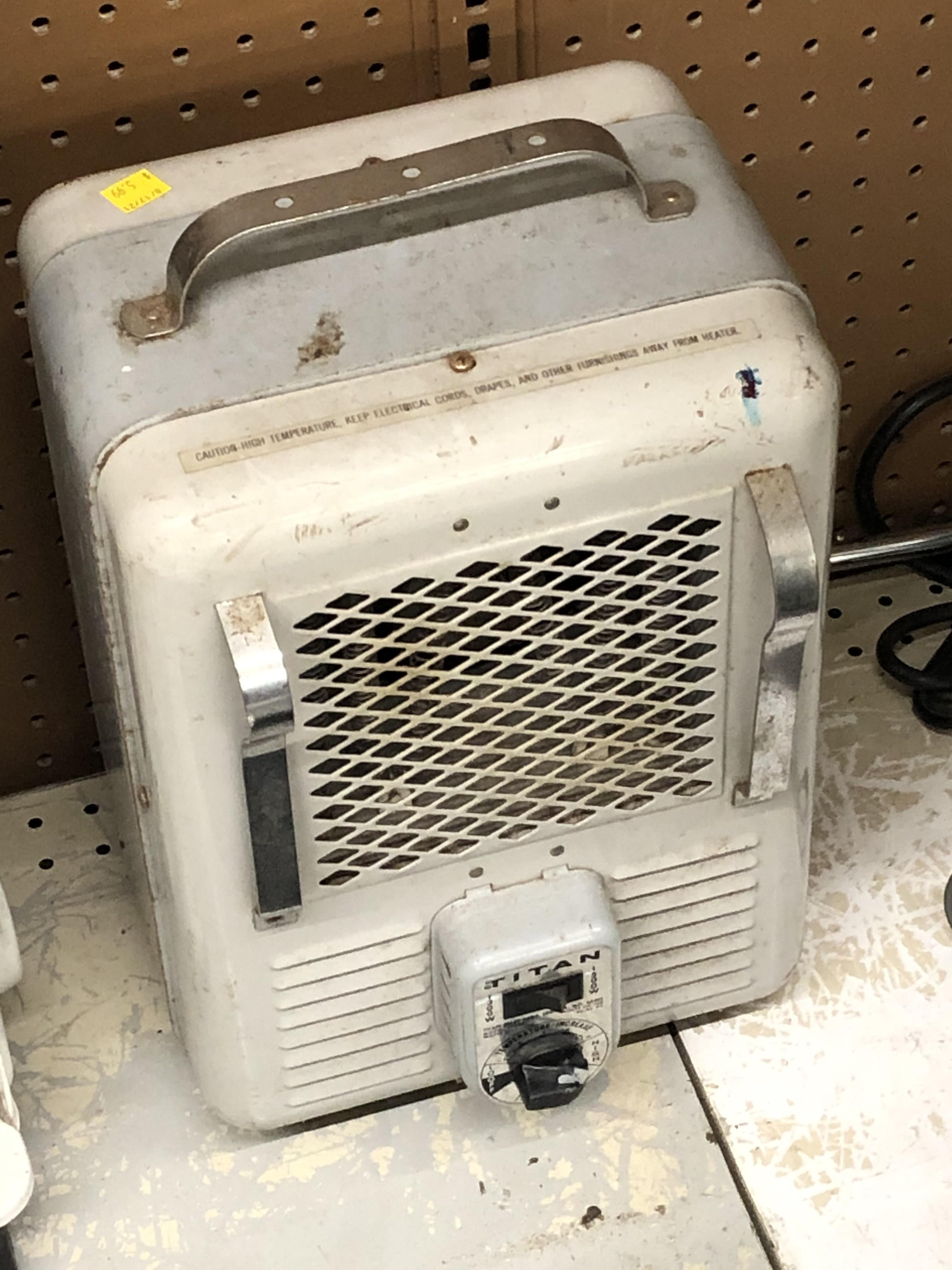 The most unsafe looking space heater I’ve ever seen. r/mildlyinteresting