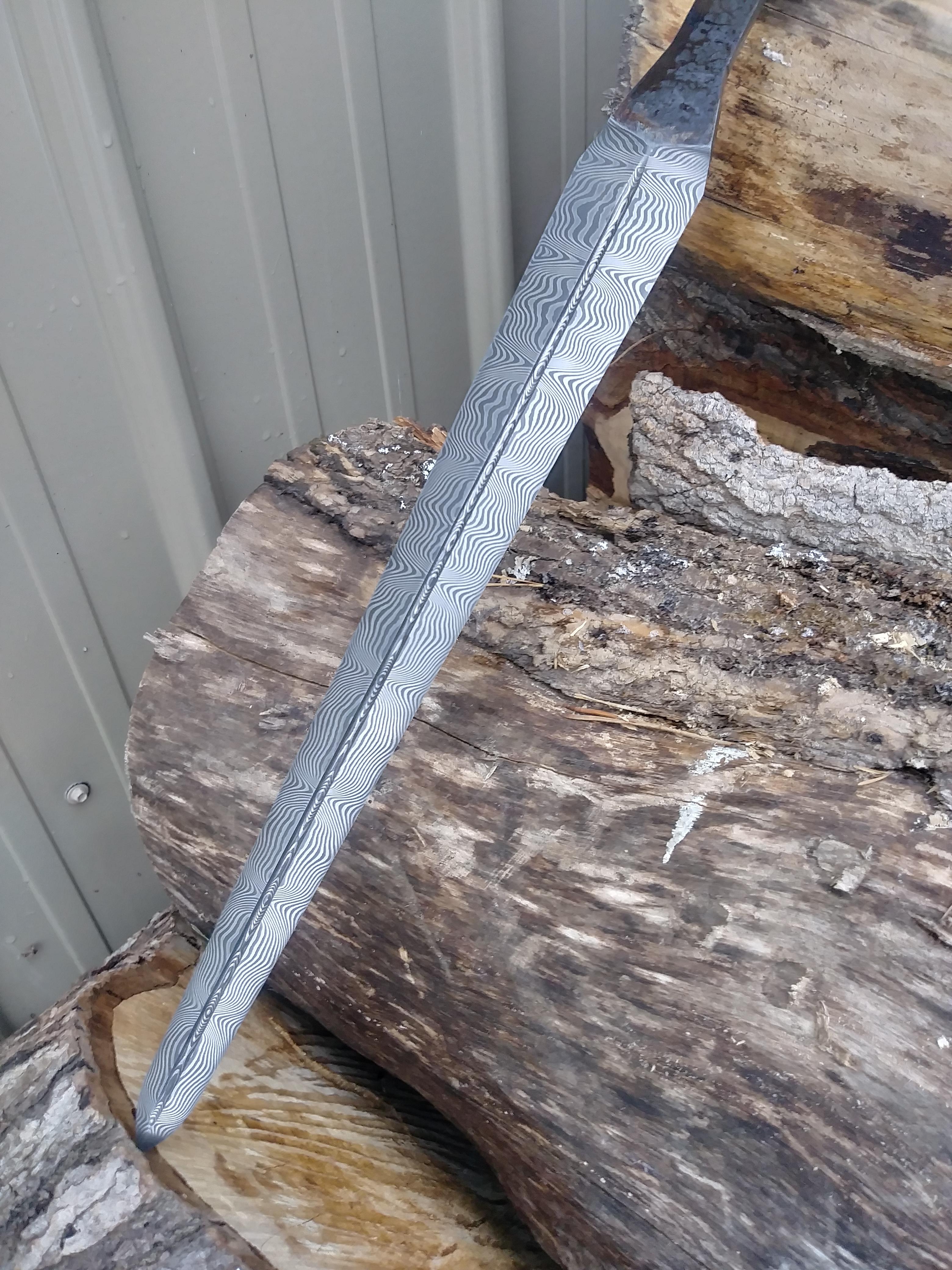 Damascus steel dagger blade that i made over the last week. 48 layers of stunted ladder pattern